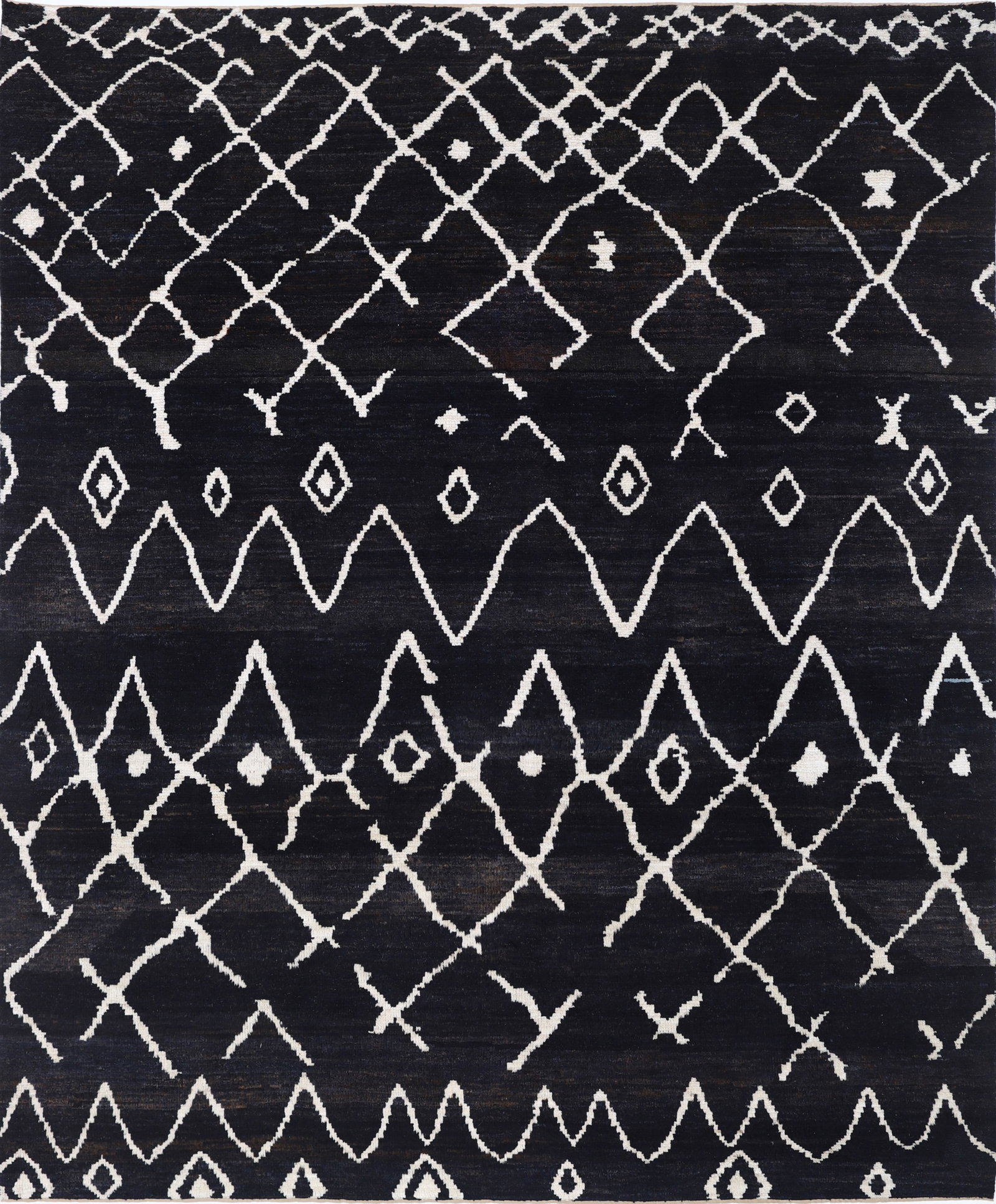Fine Hand Knotted Morocan Wool Rug - 10'0" x 8'3": Woven by skilled artisans in Afghanistan, this hand-knotted wool rug from the Morocan collection measures a poised 10'0" by 8'3" in a classic rectangular shape, showcasing a vibrant tribal design rich