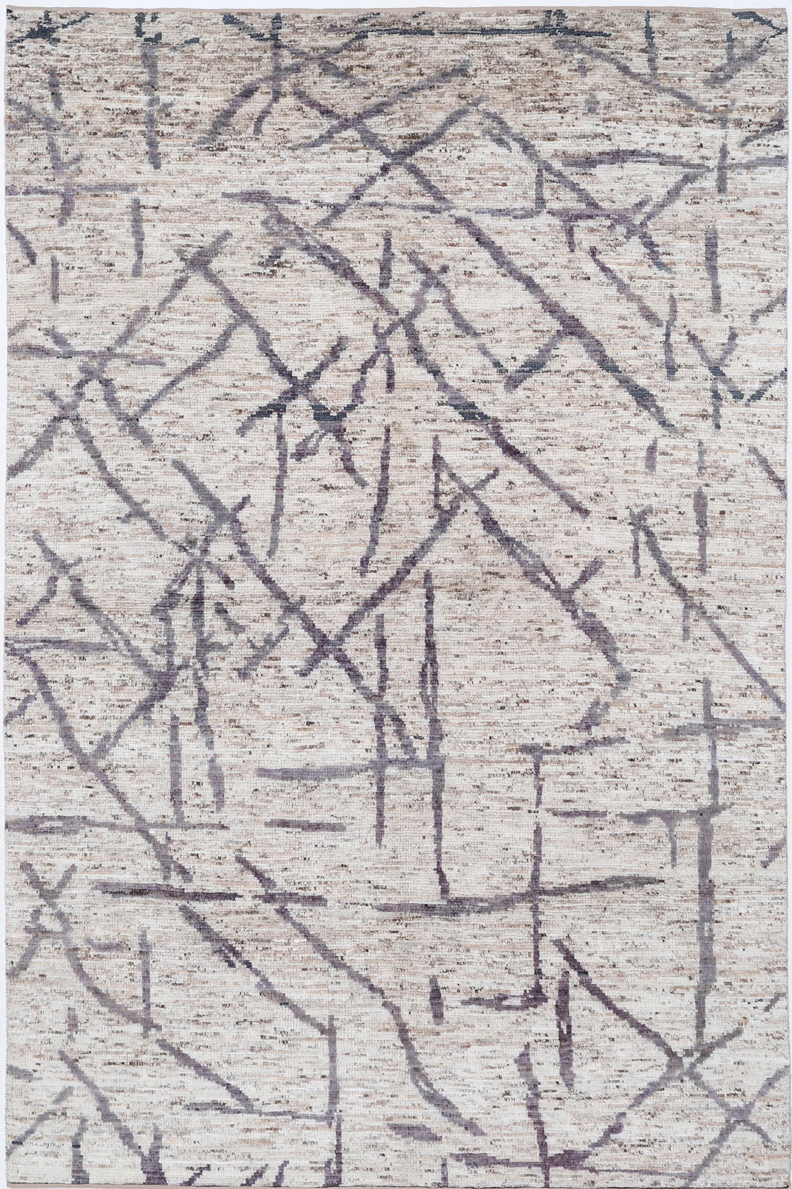 Fine Hand Knotted Morocan Wool Rug - 9'3" x 6'1": Hand-knotted in Afghanistan, this wool rug from the Morocan collection measures a compact 9?3? by 6?1? in a classic rectangular shape. Adorned with striking tribal patterns, its intricate geometric mo