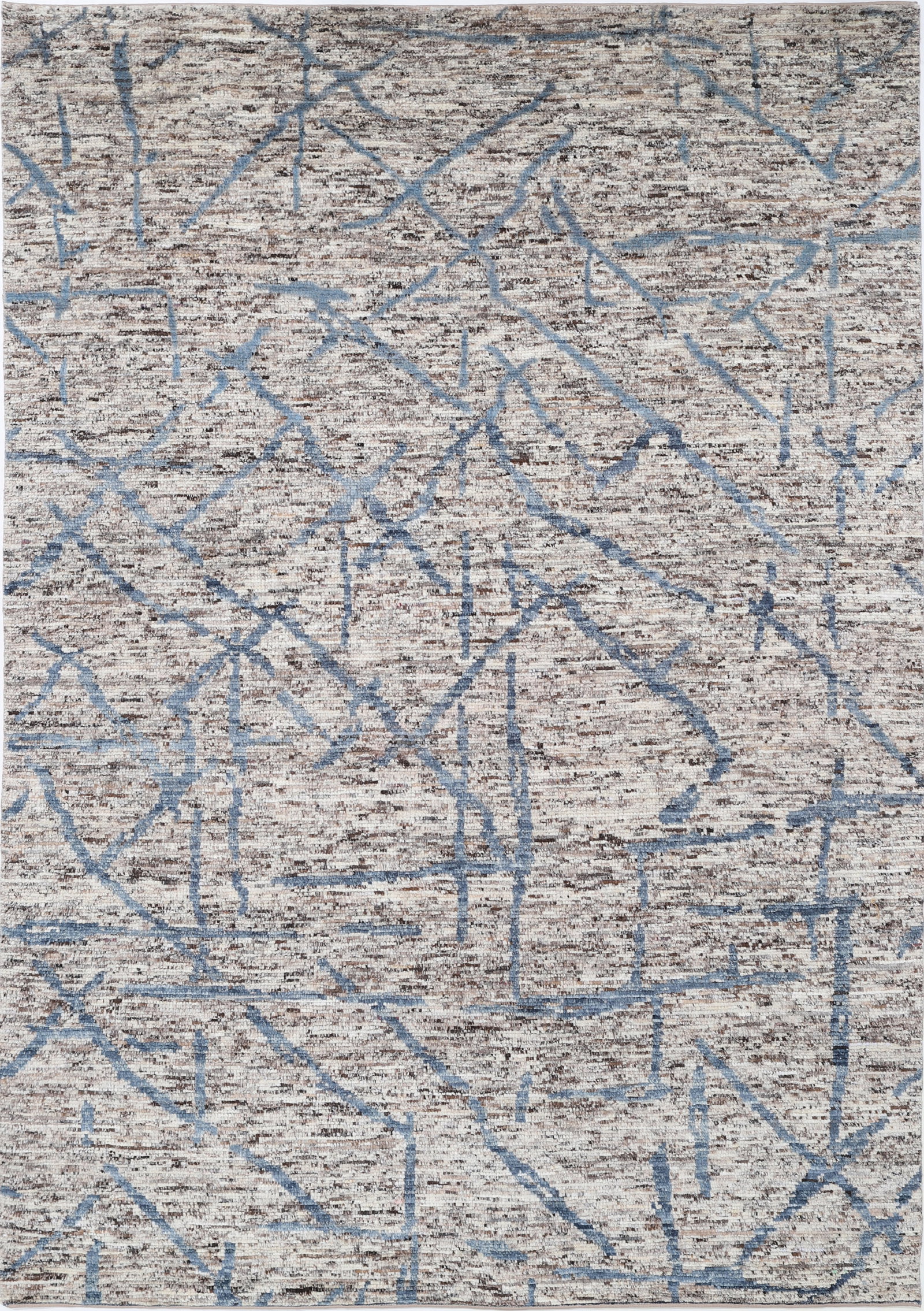 Fine Hand Knotted Morocan Wool Rug - 8'11" x 6'2": Hand-knotted in Afghanistan, this wool rug from the Morocan collection measures 8?11? by 6?2? with a traditional rectangular shape. The tribal design features intricate, bold geometric patterns in war