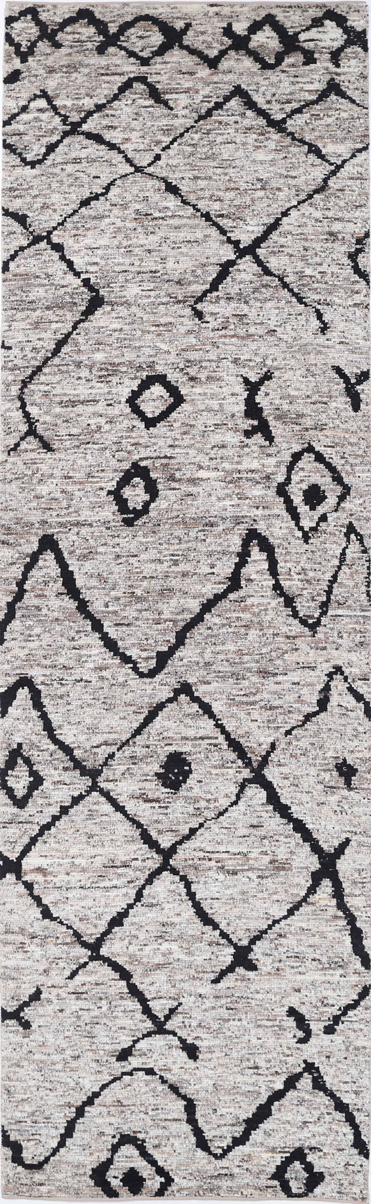 Hand Knotted Morocan Wool Rug - 11'9" x 3'5": This Afghan hand-knotted wool rug from the Morocan collection is designed as a runner, measuring 11?9? by 3?5?. Featuring a striking tribal style, it displays intricate geometric patterns in warm eart