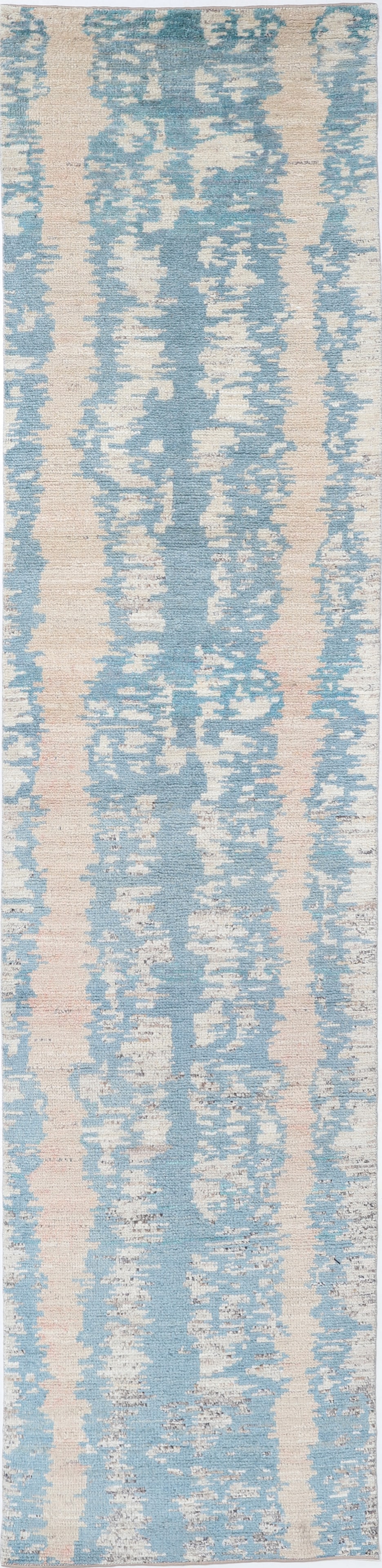 Hand Knotted Morocan Wool Runner - 12'3" x 2'8": This hand-knotted wool runner from Afghanistan?s Morocan collection measures 12?3? by 2?8?. It features an authentic tribal style with intricate geometric designs in warm, earthy tones that reflect it