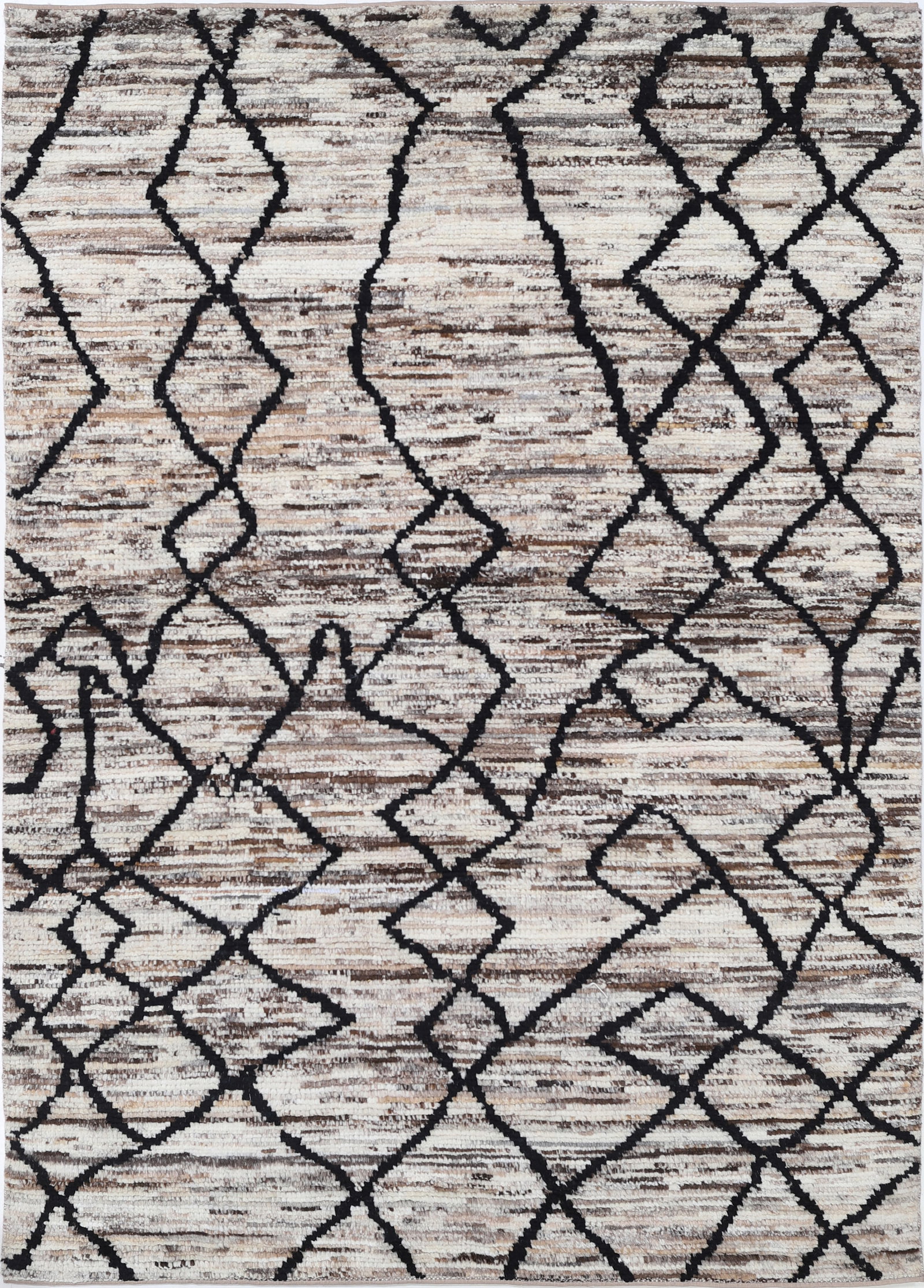 Fine Hand Knotted Morocan Wool Rug - 5'10" x 4'0": This hand-knotted wool rug from Afghanistan?s Morocan collection measures 5?10? by 4?0? in a classic rectangular shape. It features an authentic tribal style with intricate geometric patterns in warm,