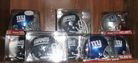 Eight NY Giants Autographed Mini Helmets: Eight NY Giants Autographed Mini Helmets including Eli Manning, Steve Smith, 4 team signed, All obtained at the Univ of ALbany traing camp