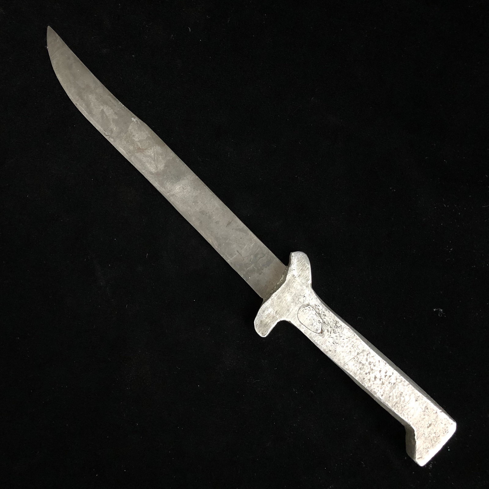 WWII Theater Made Trench Art Knife from Old File: WWII theater made fixed blade trench art fighting knife made from an old file. Solid piece. Cast aluminum grip. Blade is in good shape! Sorry, no sheath.