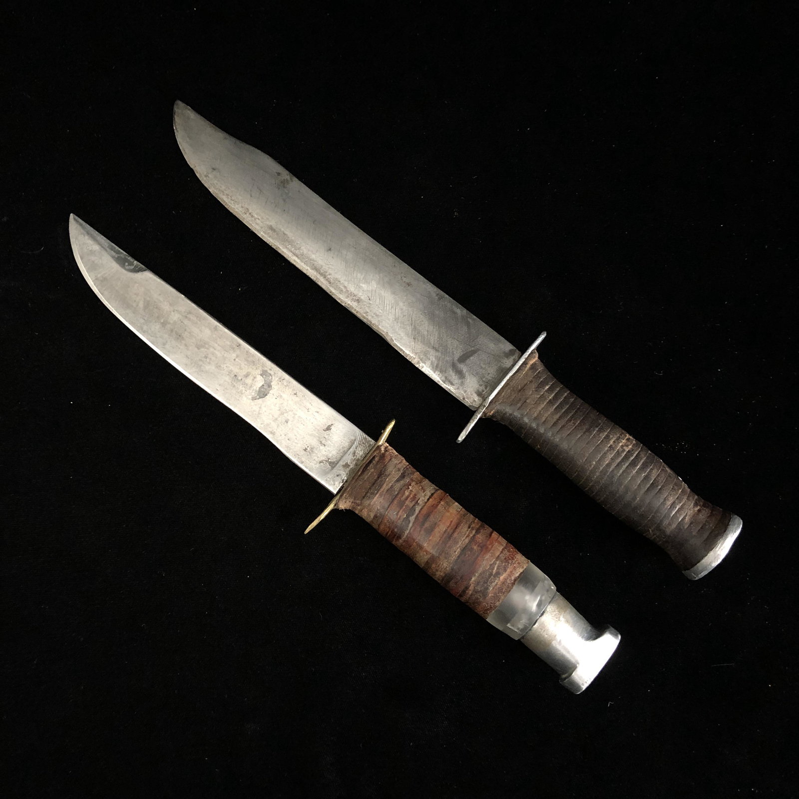 Named and Unnamed WWII Theater Made Trench Art Knives: WWII theater made fixed blade trench art fighting knife named to a W.L. Shannon. Carbon steel blade, scrap brass guard, leather and plexiglass washer grip, and cast aluminum pommel. Sorry, no sheath.