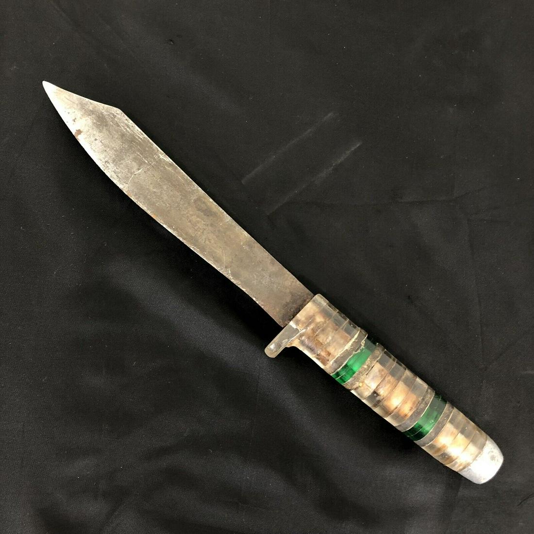 WWII Theater Made Trench Art Fighting Knife: WWII theater made fixed blade trench art fighting knife carbon steel blade grip made from plexiglass leather and scrap aluminum. Best part of this knife is the plexiglass guard! Don't see that every d