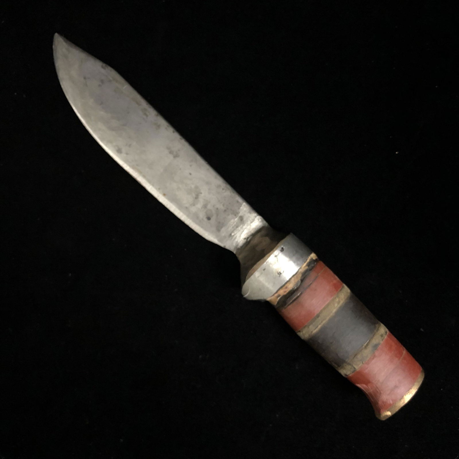 WWII Theater Made Trench Art Fighting Knife lot of 2: 1:)WWII theater made fixed blade trench art fighting knife composed of carbon steel blade scrap brass aluminum and Bakelite. Crude solid and ugly. Would hate to be on the receiving end of this one. So