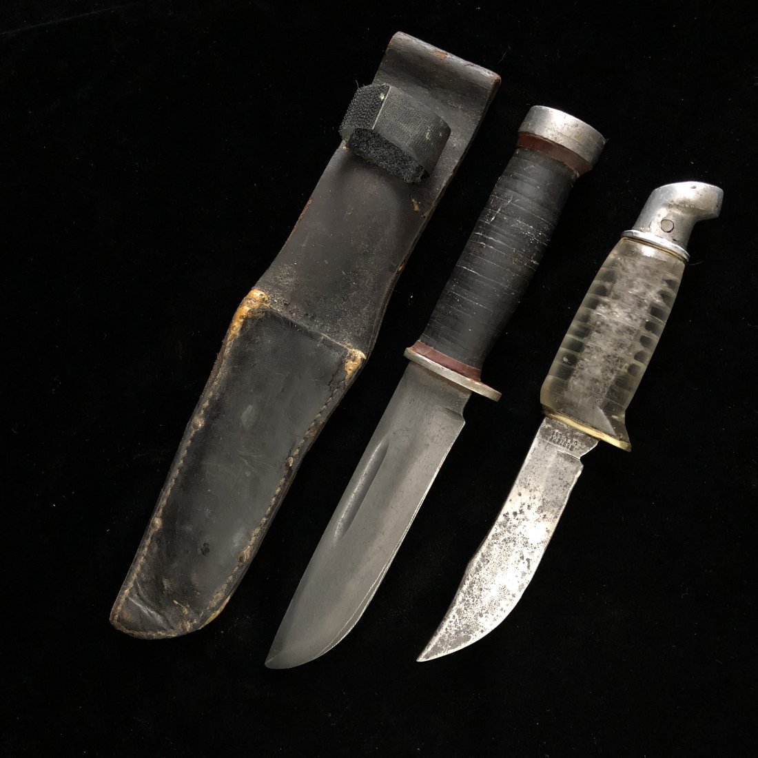 WWII Western and Cattaragus 225Q Knife lot: WWII Western and Cattaragus Knife lot1)WWII theater modified trench art grip Western Made in USA L66 brand fixed blade fighting hunting knife. Grip is scrap plexiglass and brass. Blade is pitted but s
