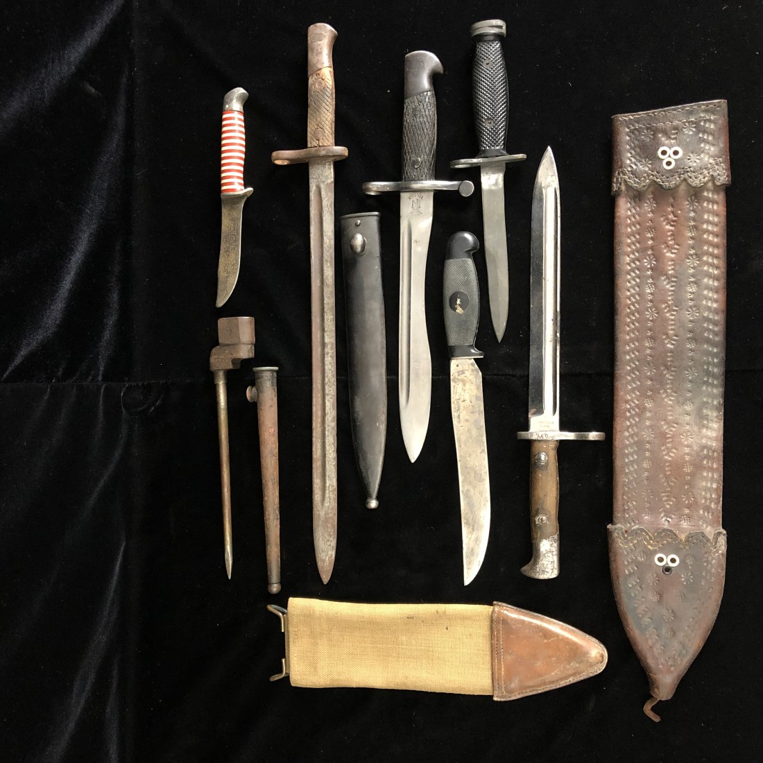 Large lot of Antique knives & bayonets Spanish American British etc.: Lot includes:Three antique and vintage Spanish bayonets to include an 1880s bayonet a B740 1893 bayonet and a 1916 Spanish short rifle bayonet with scabbard. All locking pins working. Some mild rust o