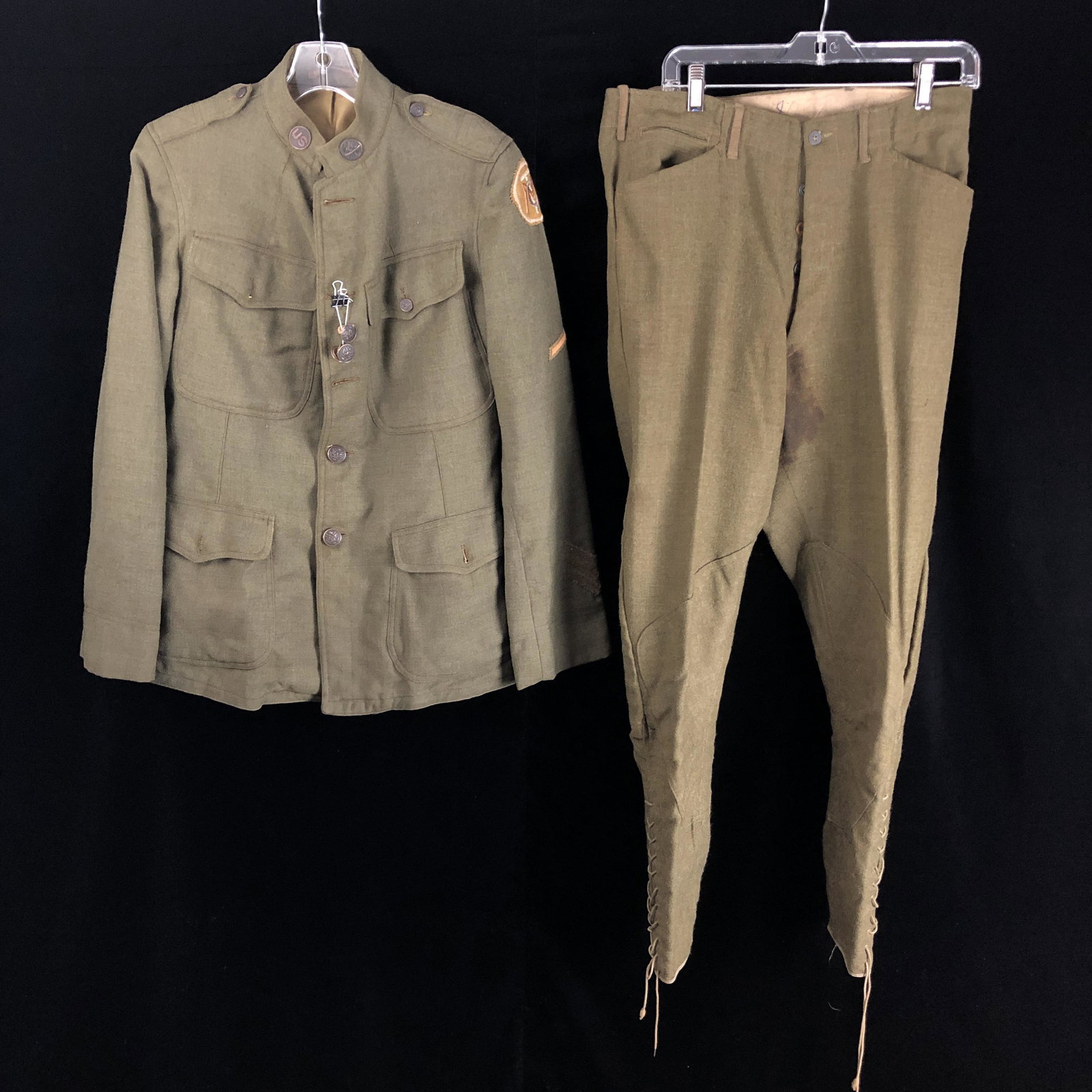 WWI US Army Motor Transport Corps Wool Uniform - Named: WWI Named US Army motor transport corps uniform wool coat and riding pants in good shape, except for a large stain in the crotch of the pants, several buttons have come off but are still with the jack