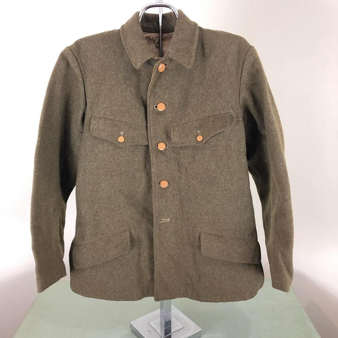 WWII IJA Imperial Japanese Army Wool Uniform Jacket: WWII Imperial Japanese Army Wool uniform coat in hood shape named on the inside. Some staining inside, might be organic __. Missing bottom button. Includes sword hanger in the back.