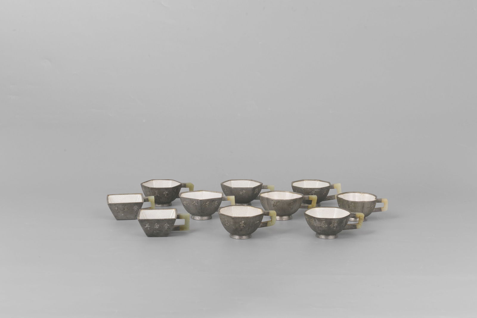 Ten tin cups (1 of 7)