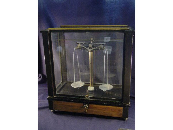 William Ainsworth Balance Beam Scale: This offering is for a very old and rare W. M. Ainsworth & Son Inc. Balance Beam Scale; Type DL, Serial No 10197. This piece appears to be in good condition and the front panel door slides very well a