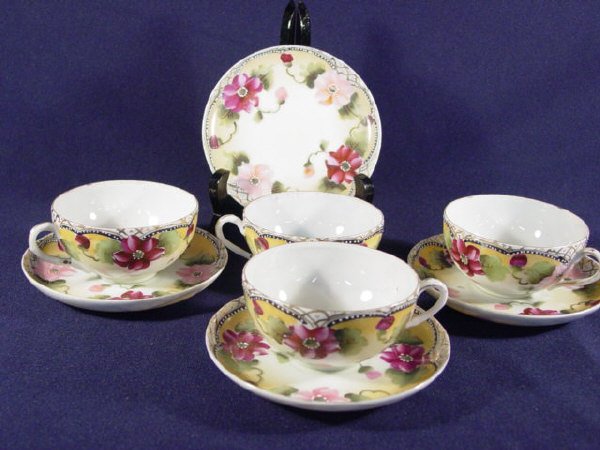 Set of 4 Hand Painted Cups & Saucers