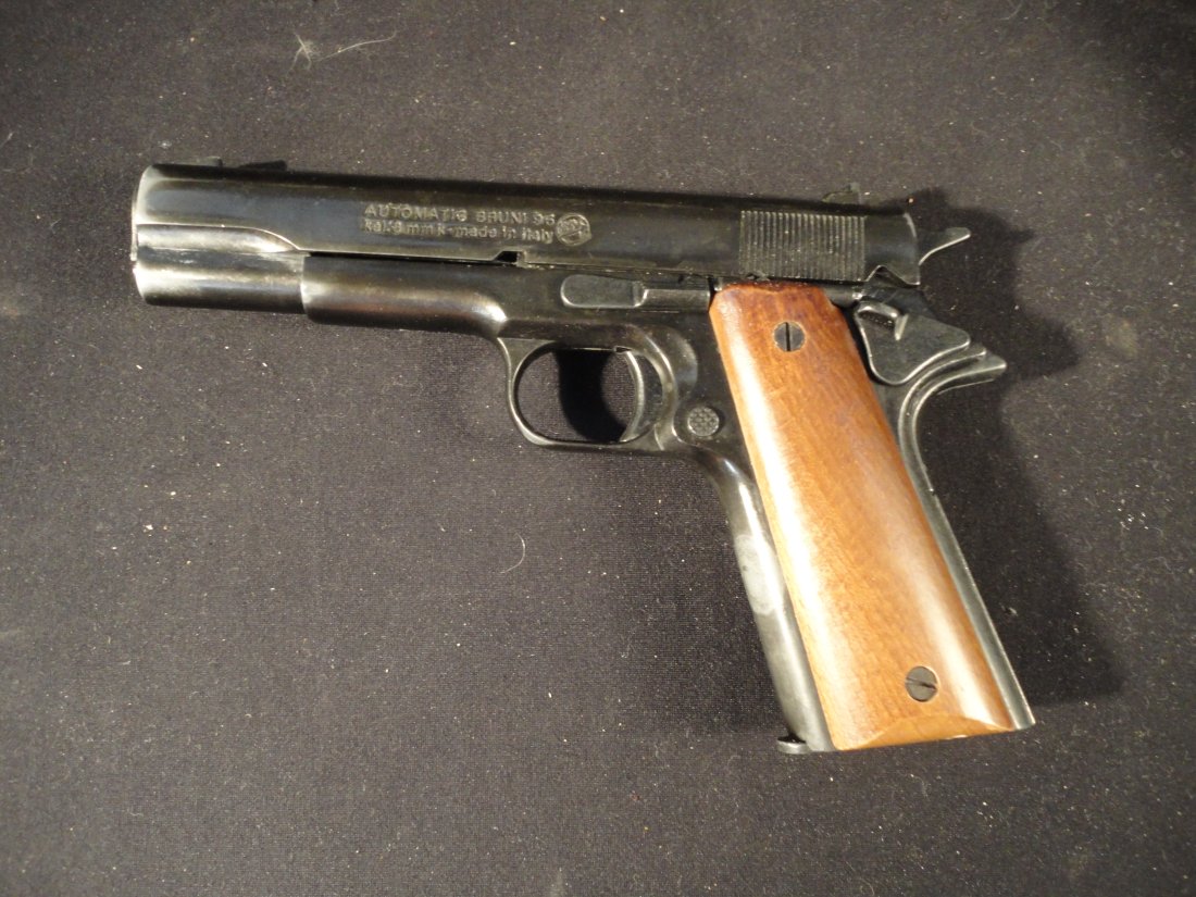 Bruni 96 - M 1911 Improved .45 Government Automatic Blank Firing Replica Gun.: Bruni 96 - M 1911 Improved .45 Government Automatic Blank Firing Replica Gun. This replica gun is in good or better condition as pictured. The Trigger does not fire the round after it is cocked. The t