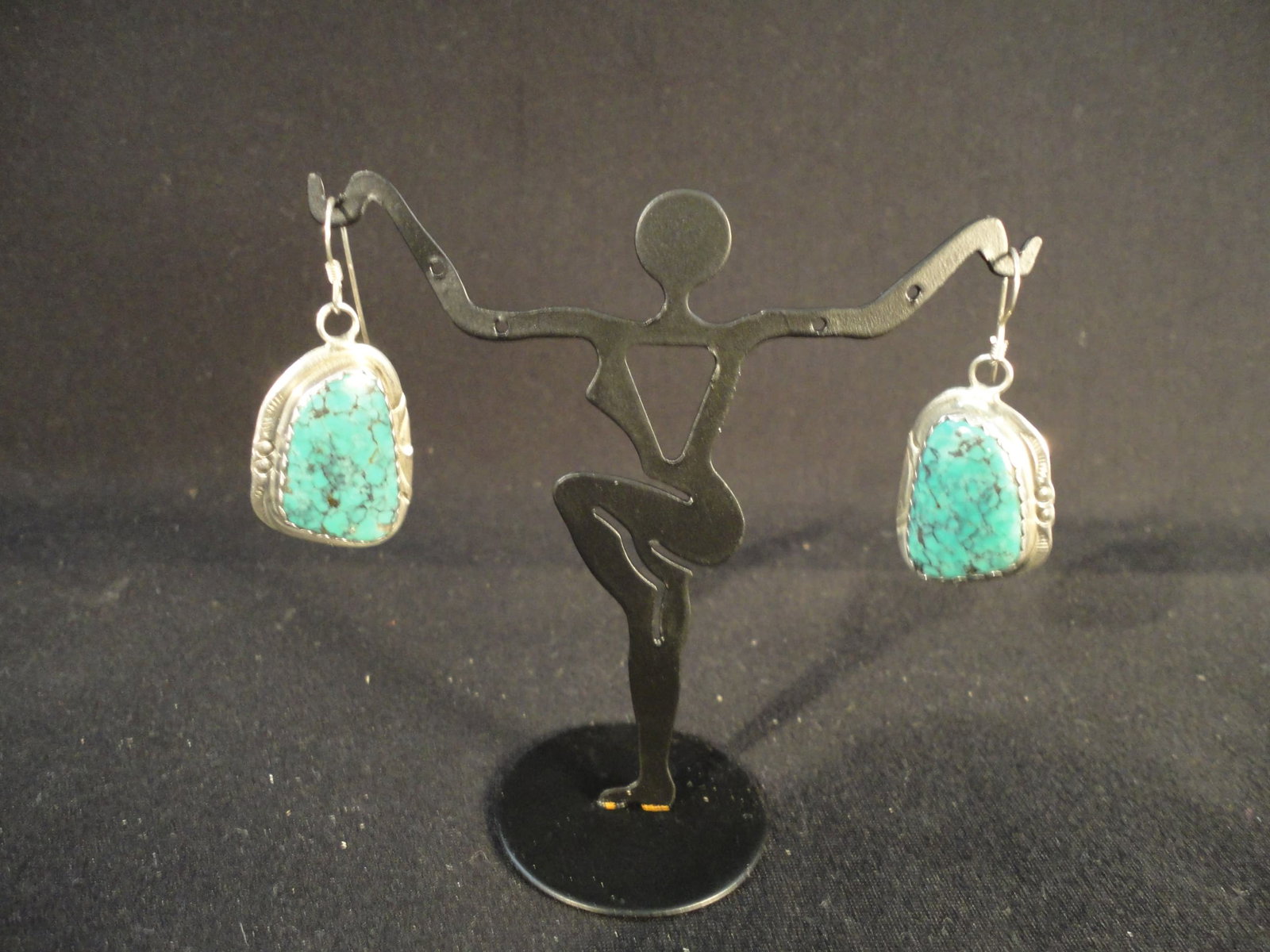 Vintage Pair of Navajo Sterling Silver and Turquoise Earrings by Clarence Bailon Santo Domingo.: Vintage Pair of Navajo Sterling Silver and Turquoise Earrings by Clarence Bailon Santo Domingo. These Clarence Bailon Earrings are in Excellent Condition as pictured. Sterling Silver and signed on the