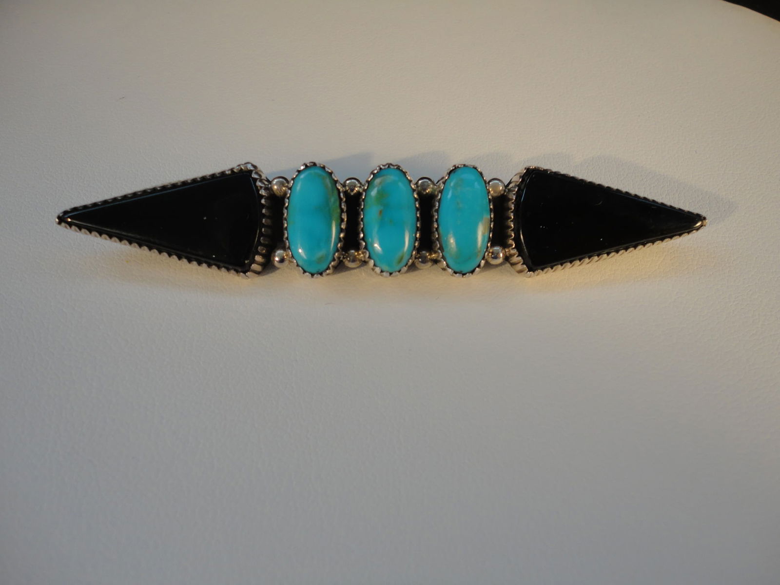 Vintage Navajo Large Signed Turquoise and Apache Tear Obsidian Bar Pin: Vintage Navajo Large Signed Turquoise and Apache Tear Obsidian Bar Pin. This Navajo Bar Pin is in Very Good condition as pictured. Signed on the back with "Sterling" and initials that we can't make ou