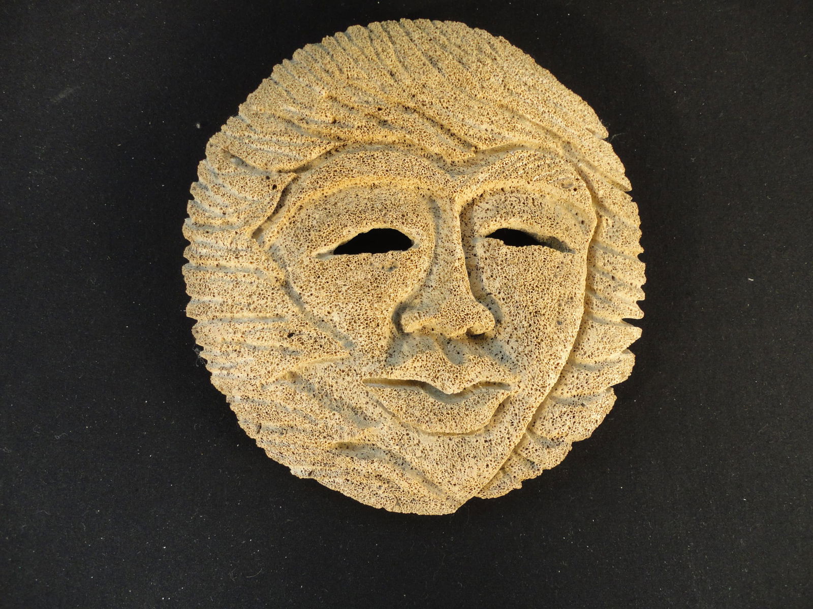 Vintage Jim Bell Signed Fossilized Whale Bone Carved Mask.: Vintage Jim Bell Signed Fossilized Whale Bone Carved Mask. This Fossilized Whale Bone Mask is in Very Good condition as pictured. It measures 7 3/4 inches tall and 7 inches wide. Signed on the back "J