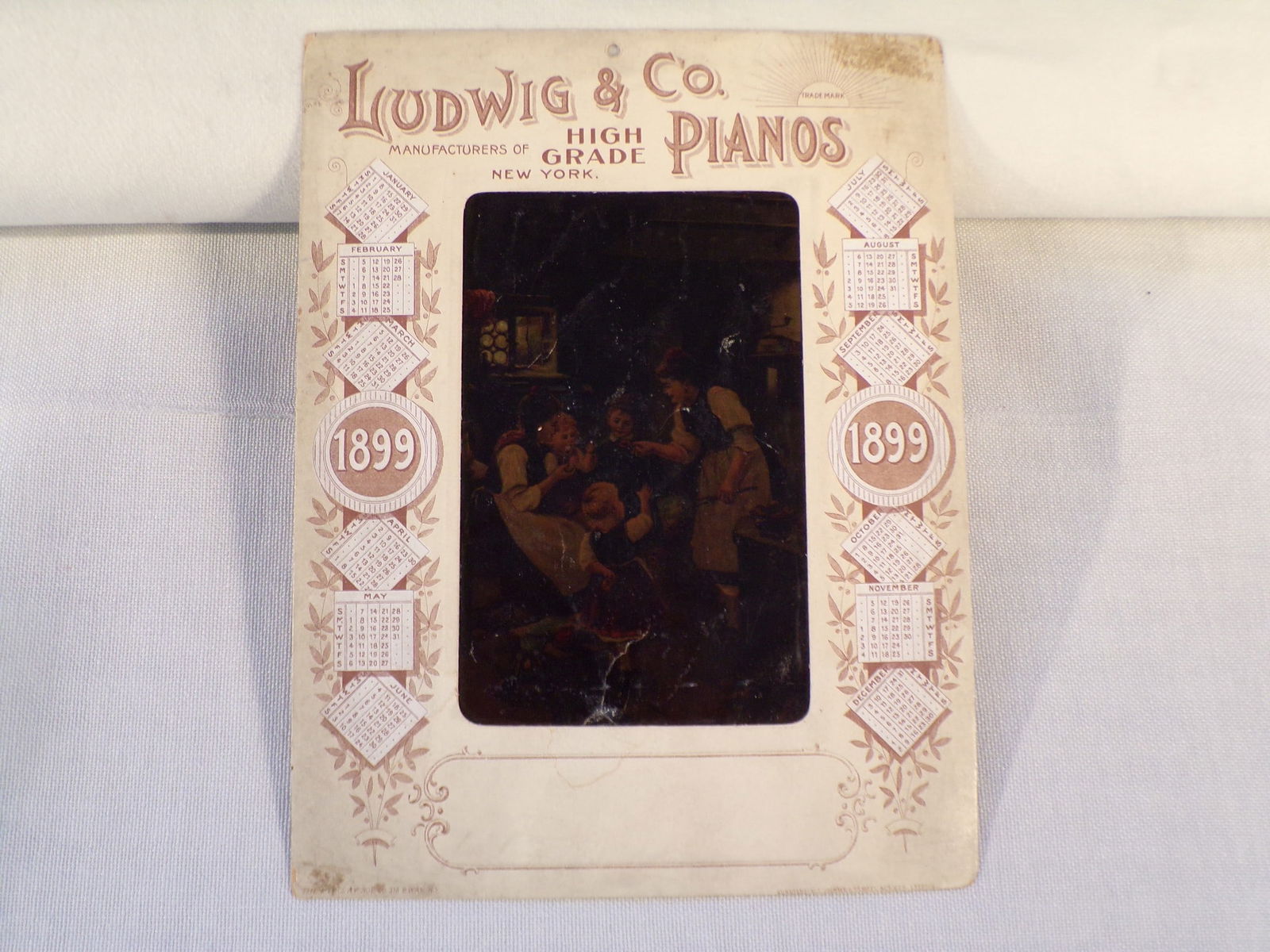 1899 Ludwig Pianos Advertising Calendar Card with Colored Negative Insert (1 of 4)
