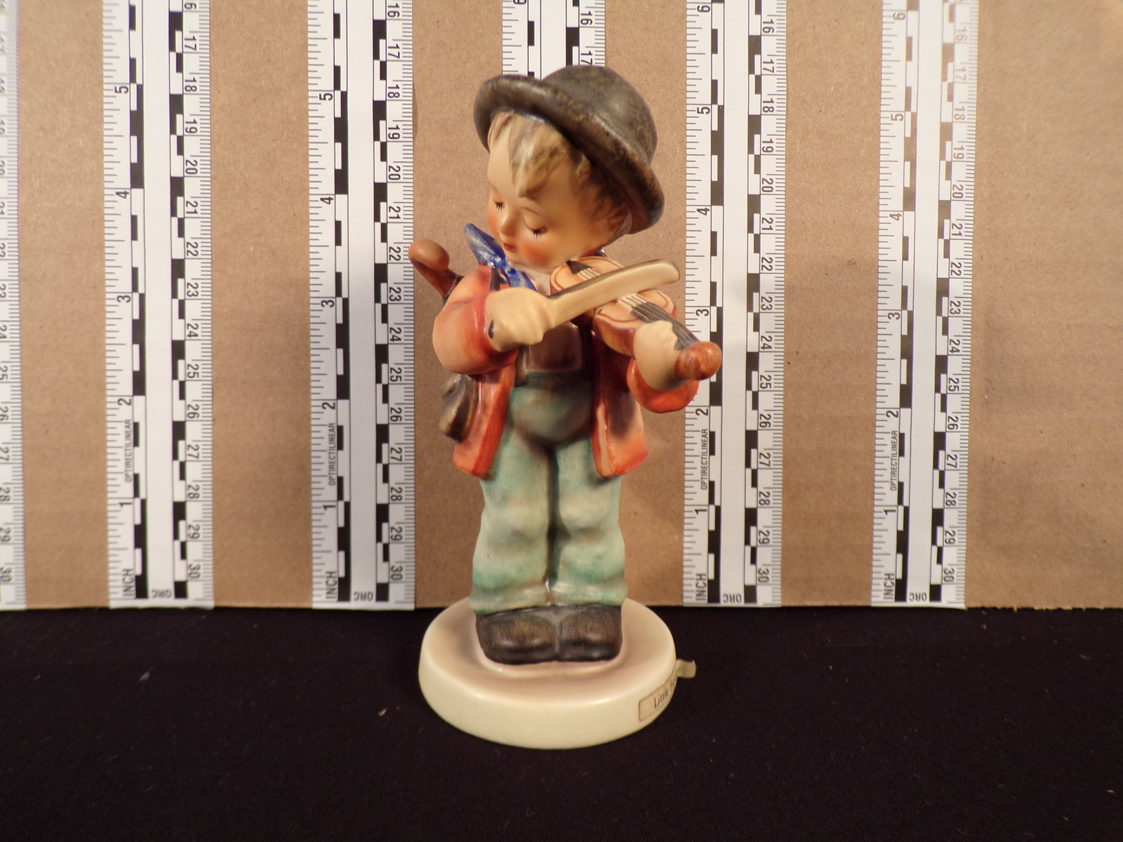 Hummel #4, Trademark # - 3, Figurine Name - Little Fiddler: Up for auction is Hummel #4, Trademark # - 3, Figurine Name - Little Fiddler, This hummel does not have a box and displays these special attributes: None. This Hummel is in excellent condition with no
