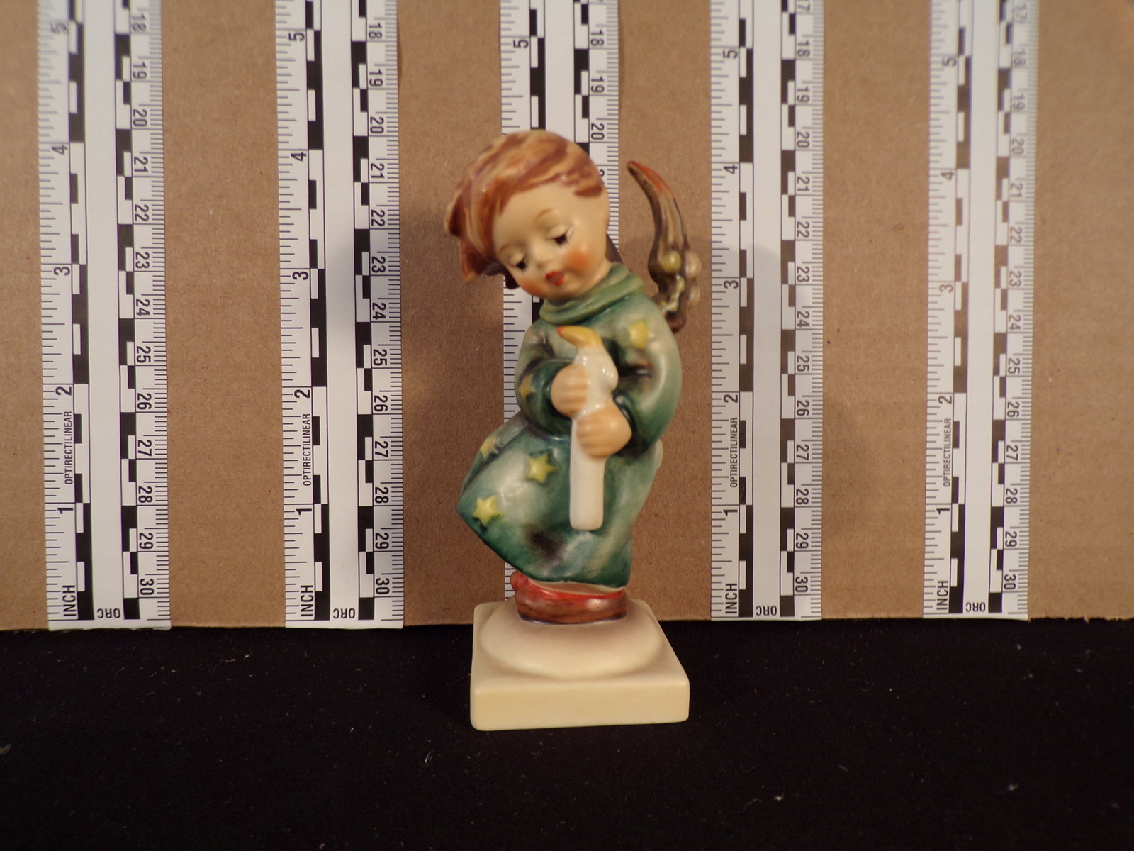 Hummel #21, Trademark # - 6, Figurine Name - Heavenly Angel: Up for auction is Hummel #21, Trademark # - 6, Figurine Name - Heavenly Angel, This hummel does not have a box and displays these special attributes: None. This Hummel is in excellent condition with n
