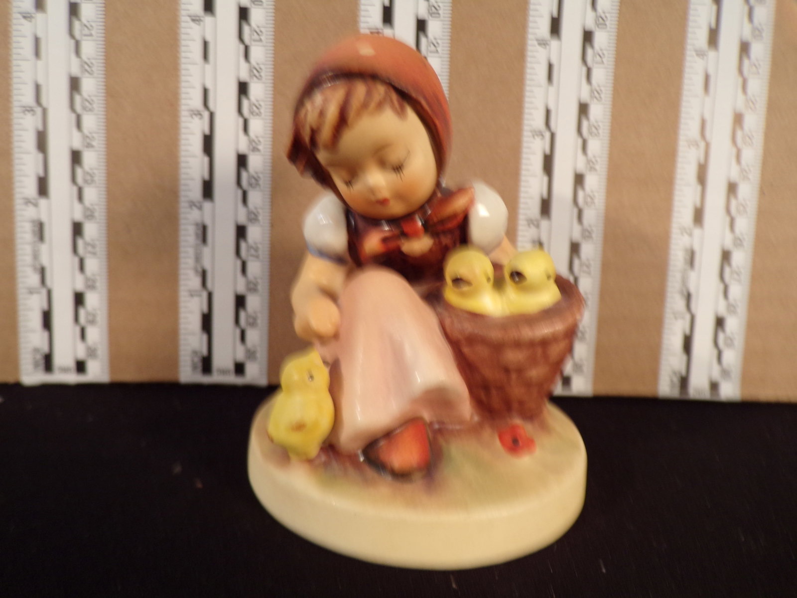 Hummel #57, Trademark # - 3, Figurine Name - Chick Girl: Up for auction is Hummel #57, Trademark # - 3, Figurine Name - Chick Girl, This hummel does not have a box and displays these special attributes: None. This Hummel is in excellent condition with no ch