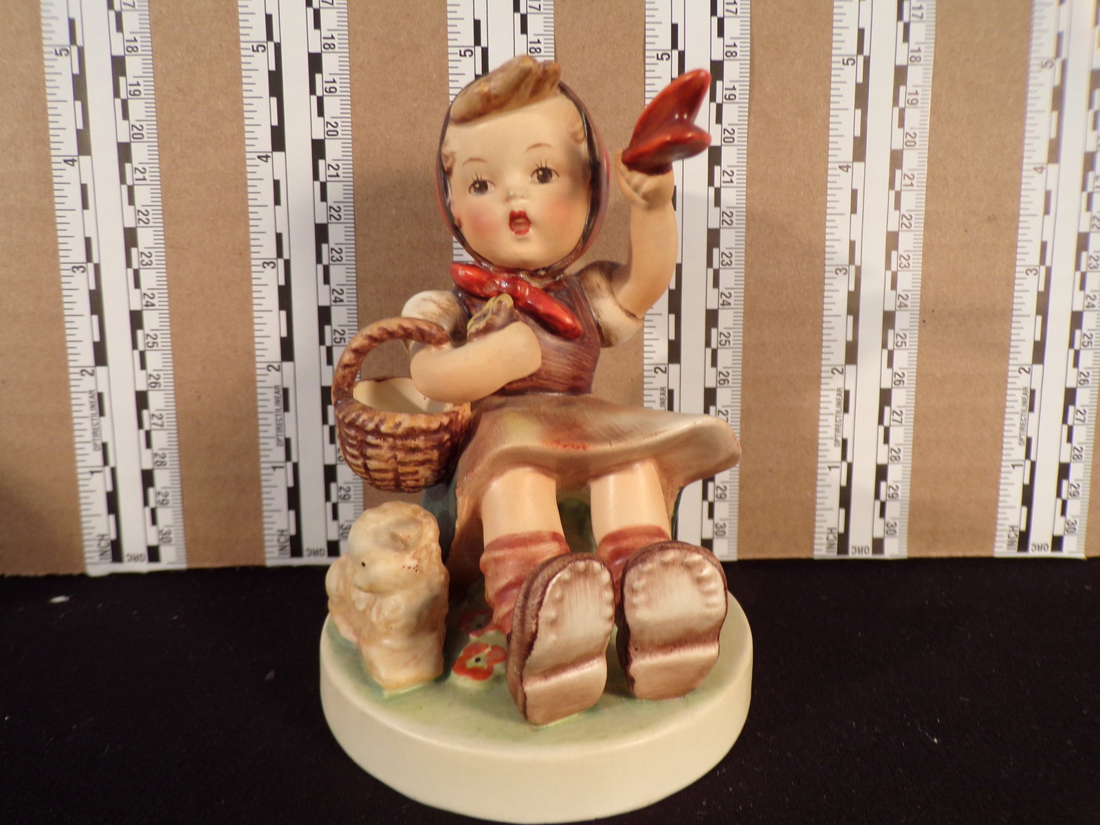 Hummel #65, Trademark # - 2, Figurine Name - Farewell: Up for auction is Hummel #65, Trademark # - 2, Figurine Name - Farewell, This hummel does not have a box and displays these special attributes: None. This Hummel is in excellent condition with no chip