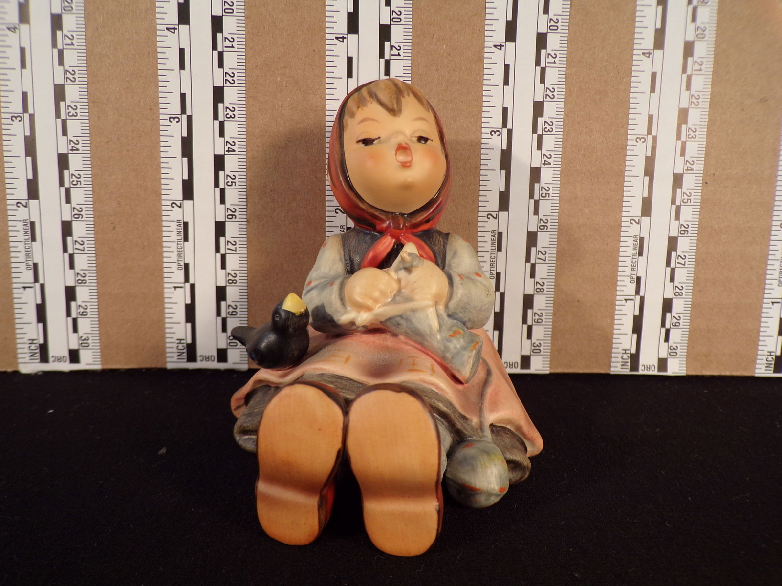 Hummel #69, Trademark # - 5, Figurine Name - Happy Pastime: Up for auction is Hummel #69, Trademark # - 5, Figurine Name - Happy Pastime, This hummel does not have a box and displays these special attributes: None. This Hummel is in excellent condition with no