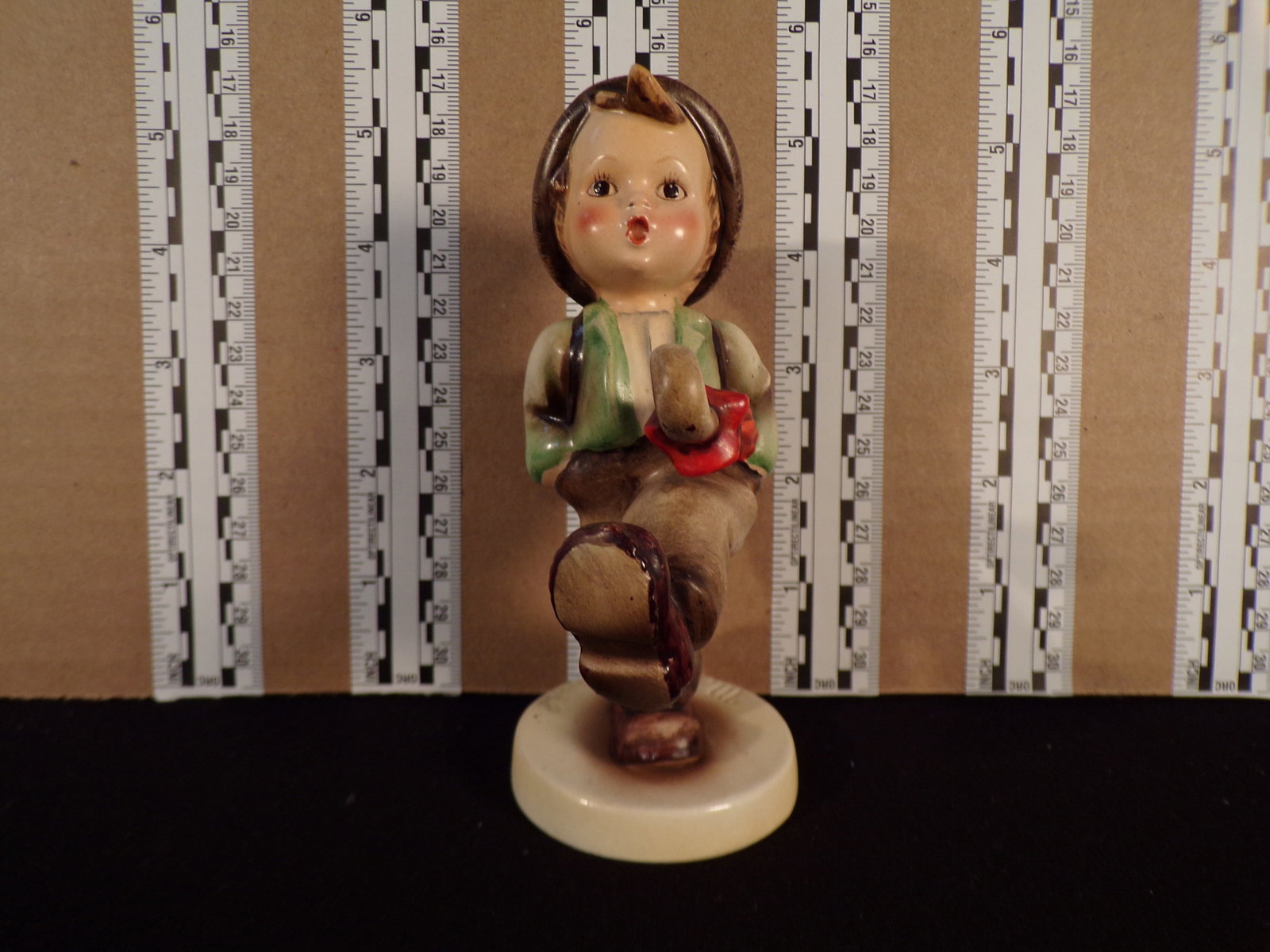 Hummel #79, Trademark # - No Mark, Figurine Name - Globe Trotter: Up for auction is Hummel #79, Trademark # - No Mark, Figurine Name - Globe Trotter, This hummel does not have a box and displays these special attributes: No Mark -- Dbl. Weave Basket Makes It Tmk1 Or