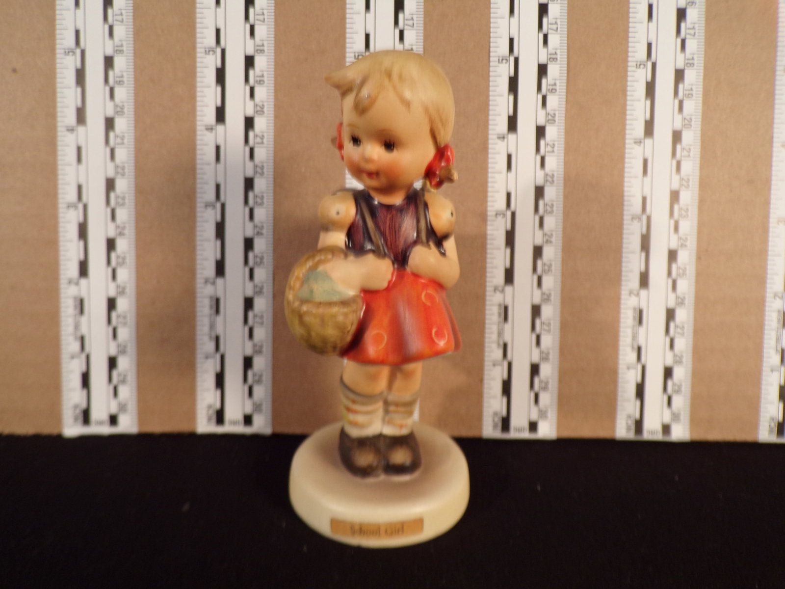 Hummel #81, Size Indicator # - 81 2/0 Trademark # - 3, Figurine Name - School Girl: Up for auction is Hummel #81, Size Indicator - 81 2/0, Trademark # - 3, Figurine Name - School Girl, This hummel does not have a box and displays these special attributes: None. This Hummel is in exce