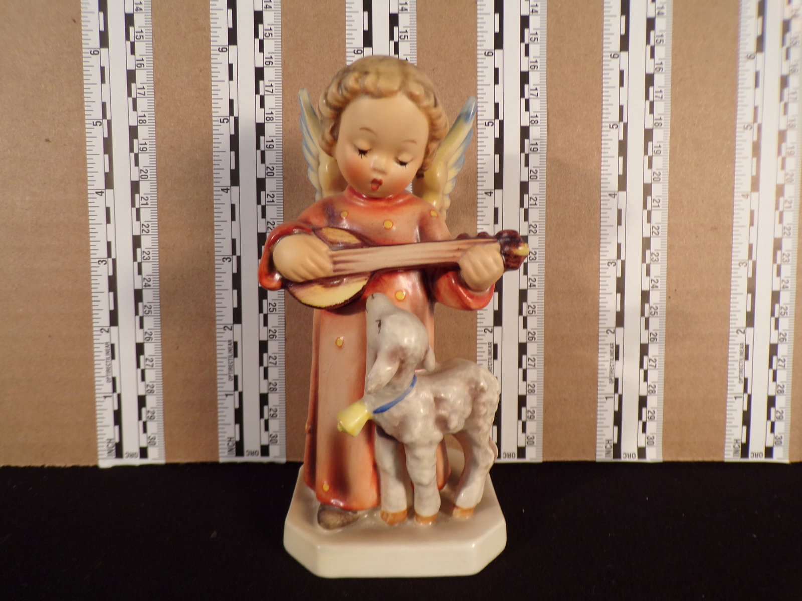Hummel #83, Trademark # - 3, Figurine Name - Angel Serenade With Lamb: Up for auction is Hummel #83, Trademark # - 3, Figurine Name - Angel Serenade With Lamb, This hummel does not have a box and displays these special attributes: None. This Hummel is in excellent condit