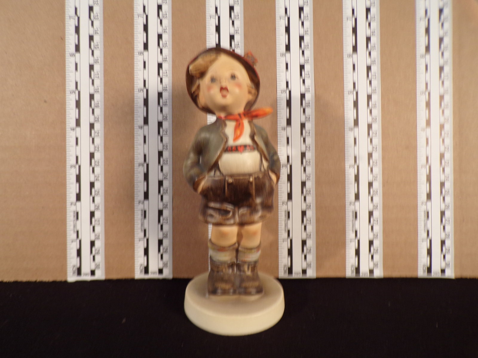 Hummel #95, Trademark # - 2, Figurine Name - Brother: Up for auction is Hummel #95, Trademark # - 2, Figurine Name - Brother, This hummel does not have a box and displays these special attributes: None. This Hummel is in excellent condition with no chips