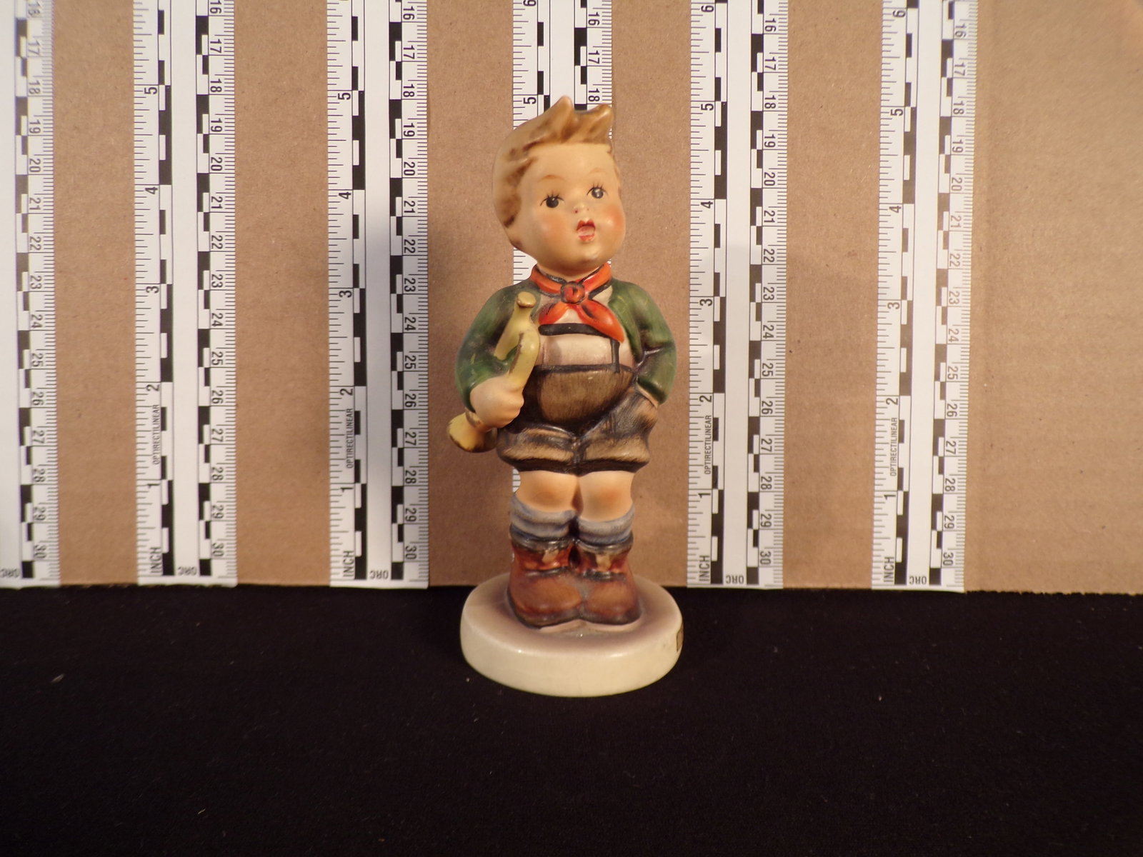Hummel #97, Trademark # - 3, Figurine Name - Trumpet Boy: Up for auction is Hummel #97, Trademark # - 3, Figurine Name - Trumpet Boy, This hummel does not have a box and displays these special attributes: None. This Hummel is in excellent condition with no c