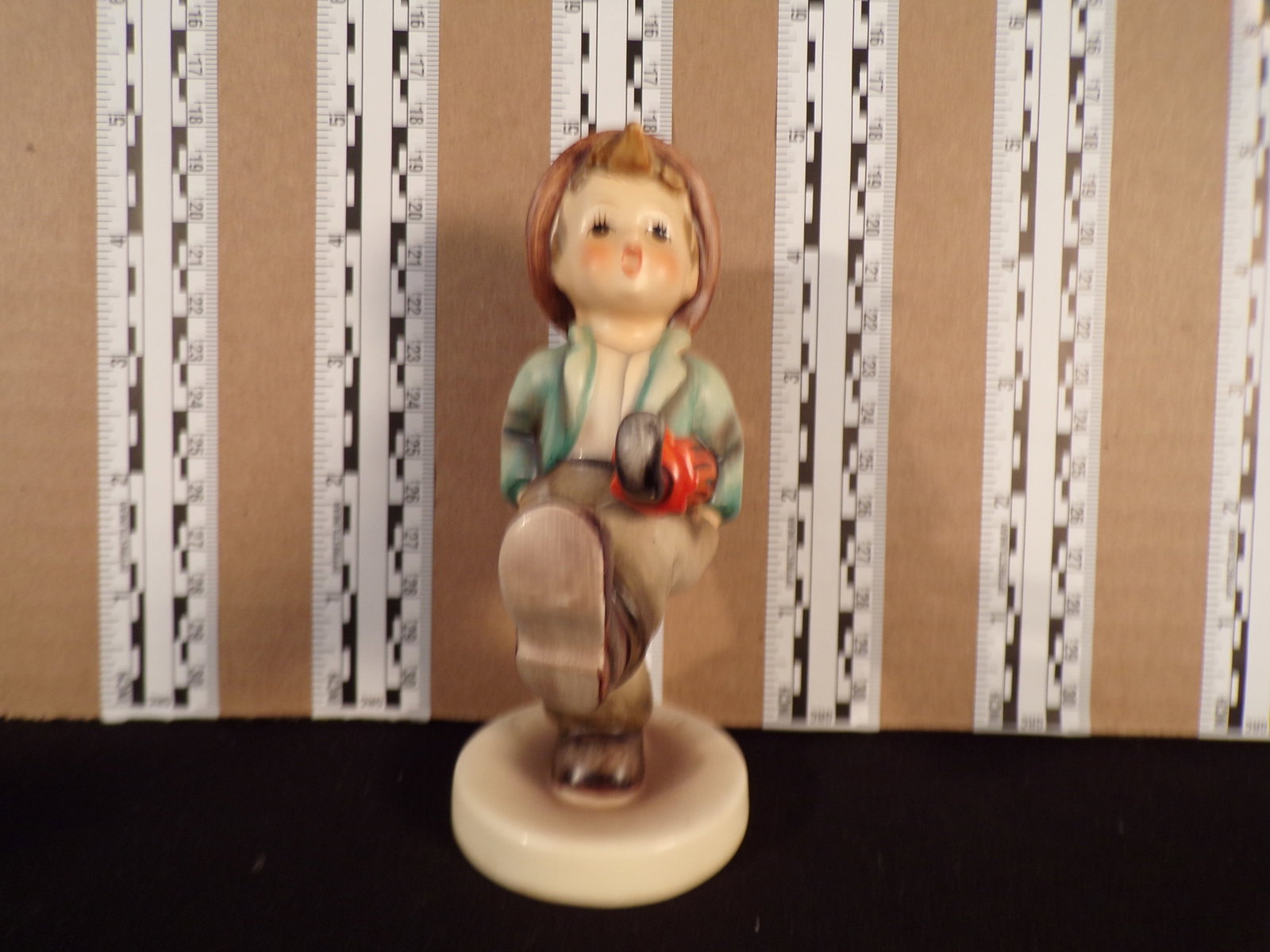 Hummel #109, Size Indicator # - 109/0 Trademark # - 3, Figurine Name - Happy Traveler: Up for auction is Hummel #109, Size Indicator - 109/0, Trademark # - 3, Figurine Name - Happy Traveler, This hummel does not have a box and displays these special attributes: None. This Hummel is in e