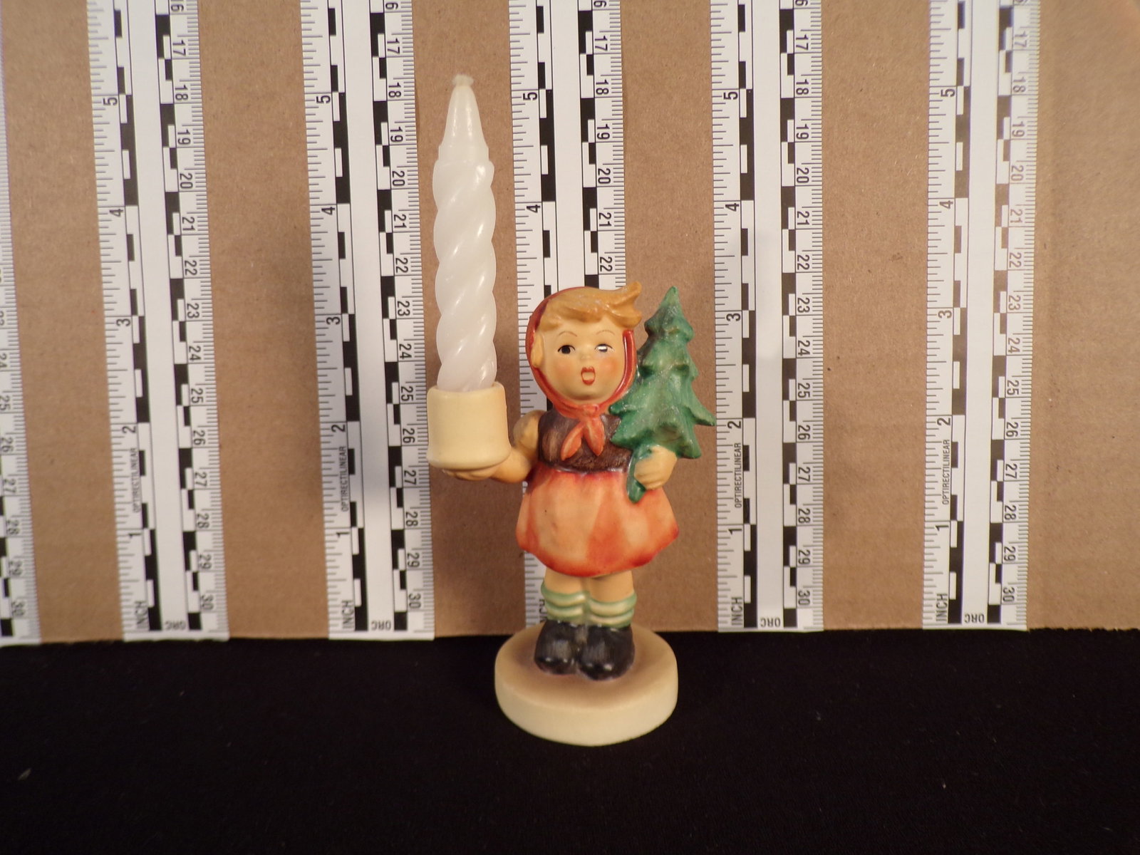 Hummel #116, Trademark # - 6, Figurine Name - Girl With Fir Tree: Up for auction is Hummel #116, Trademark # - 6, Figurine Name - Girl With Fir Tree, This hummel does not have a box and displays these special attributes: Candlestick. This Hummel is in excellent cond
