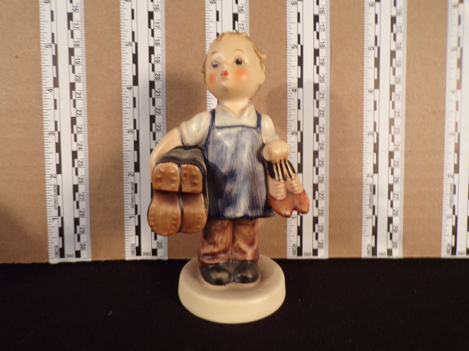 Hummel #143,  Size Indicator # - 143/0 Trademark # - 3d, Figurine Name - Boots (1 of 2)