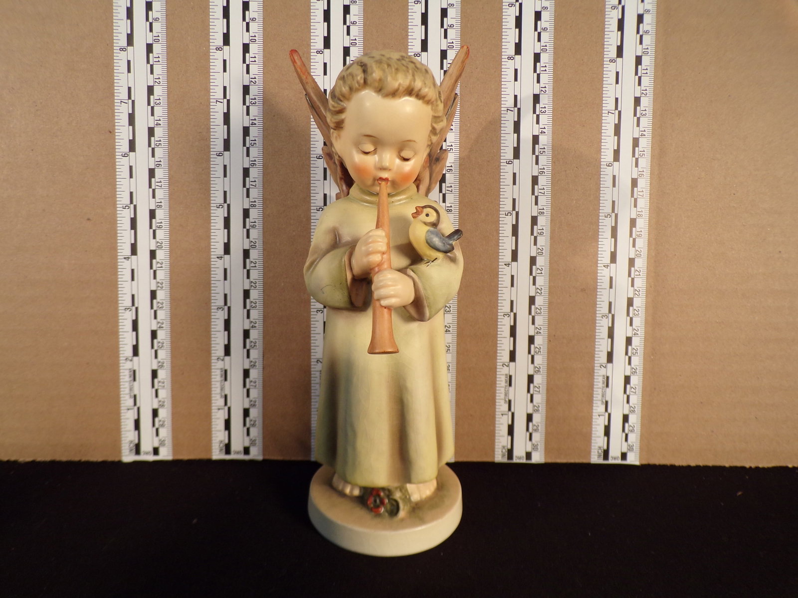 Hummel #173, Trademark # - 4, Figurine Name - Festival Harmony: Up for auction is Hummel #173, Trademark # - 4, Figurine Name - Festival Harmony, This hummel does not have a box and displays these special attributes: Angel With Flute. Chip on base edge. See pictur