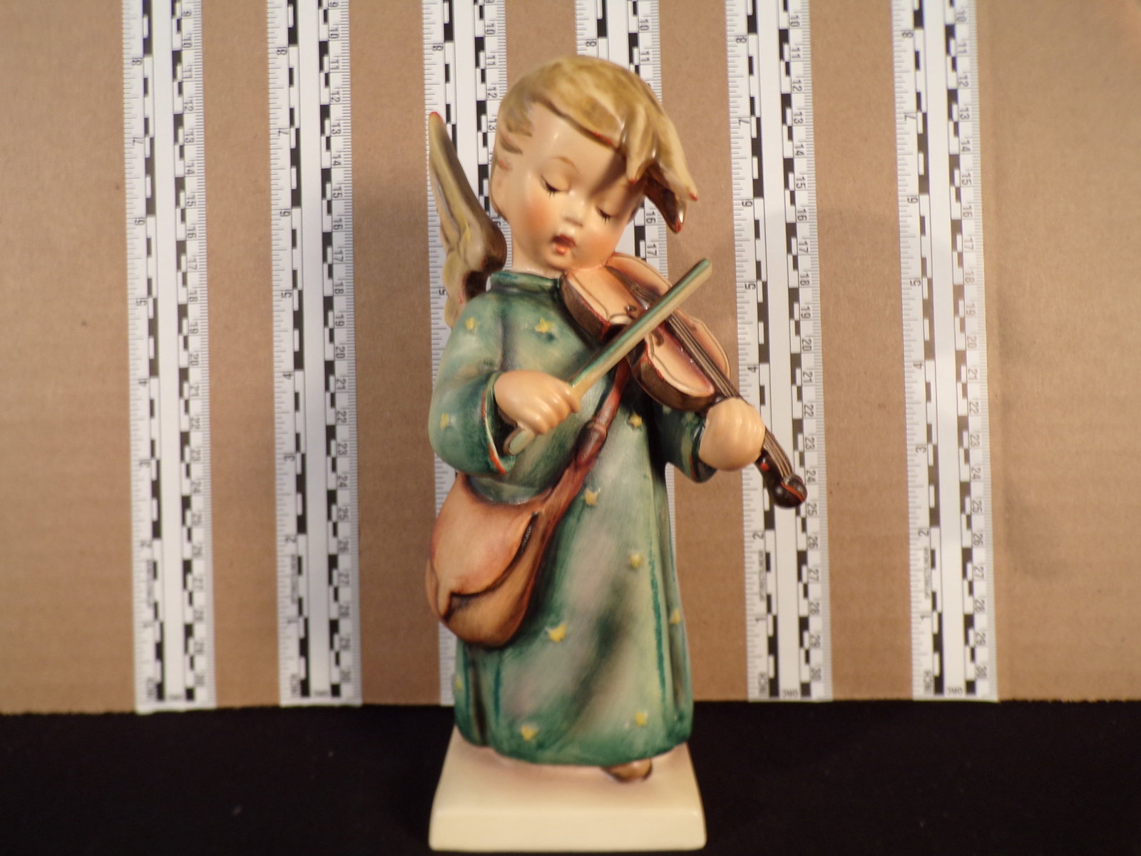 Hummel #188, Size Indicator # - 188/0 Trademark # - 6, Figurine Name - Celestial Musician: Up for auction is Hummel #188, Size Indicator - 188/0, Trademark # - 6, Figurine Name - Celestial Musician, This hummel does not have a box and displays these special attributes: None. This Hummel is 