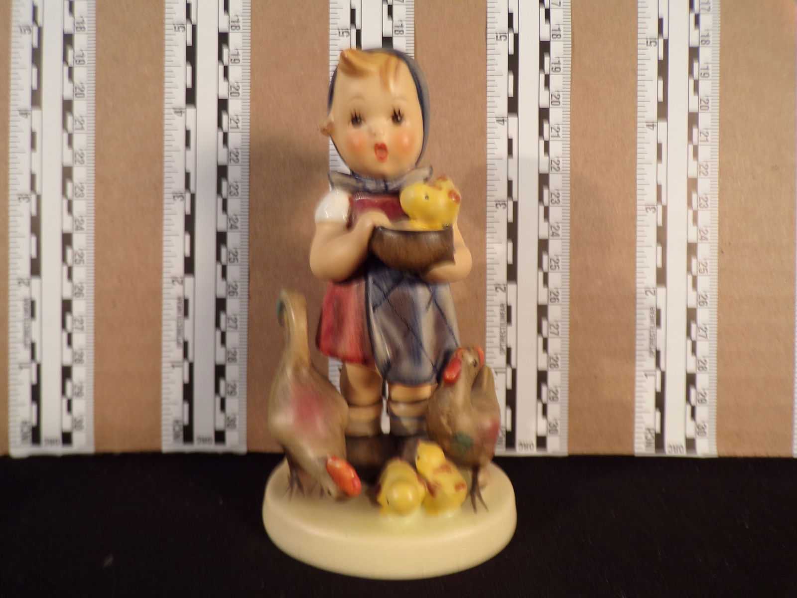Hummel #199,  Size Indicator # - 199/0 Trademark # - 4, Figurine Name - Feeding Time (1 of 2)