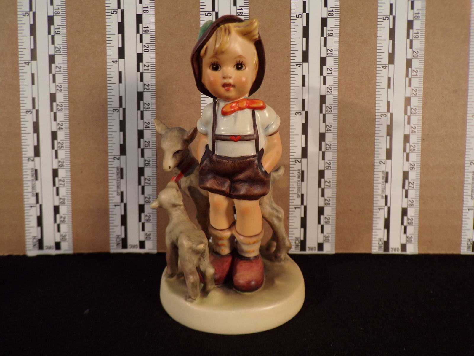 Hummel #200, Size Indicator # - 200/0 Trademark # - 4, Figurine Name - Little Goat Herder: Up for auction is Hummel #200, Size Indicator - 200/0, Trademark # - 4, Figurine Name - Little Goat Herder, This hummel does not have a box and displays these special attributes: None. This Hummel is