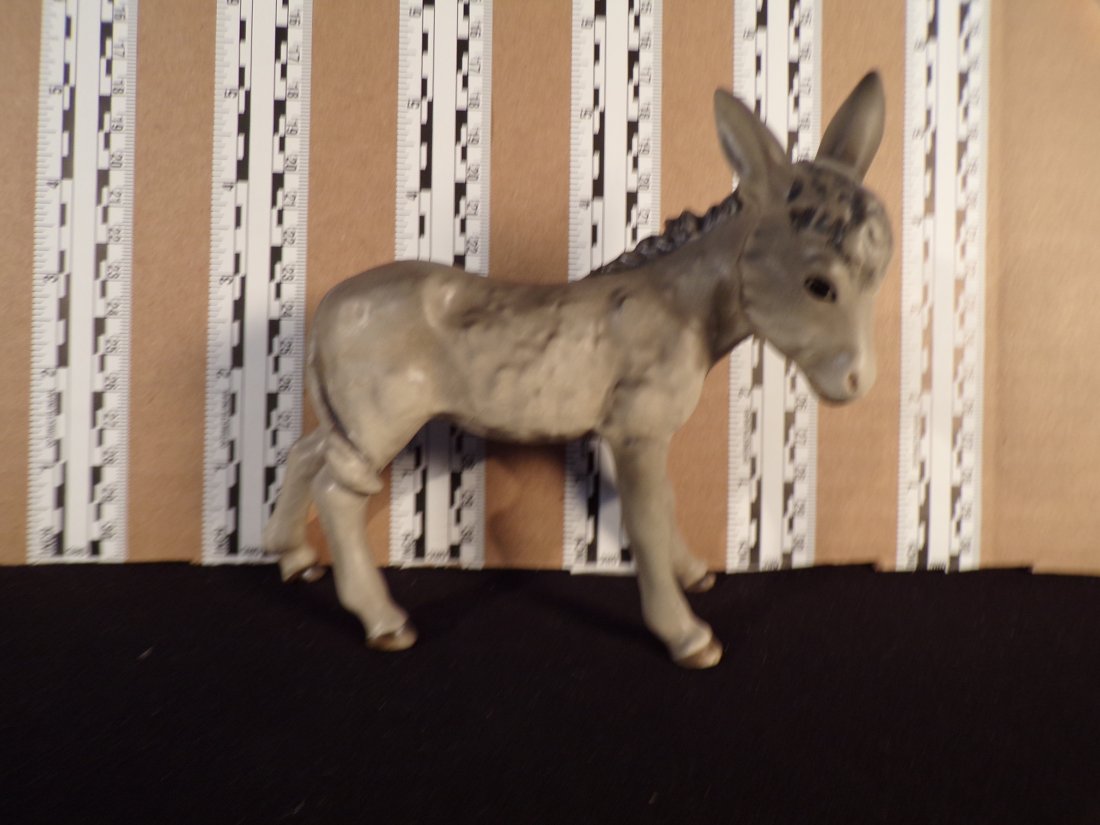 Hummel #214,  Size Indicator # - 214/j Trademark # - 6, Figurine Name - Donkey (1 of 2)