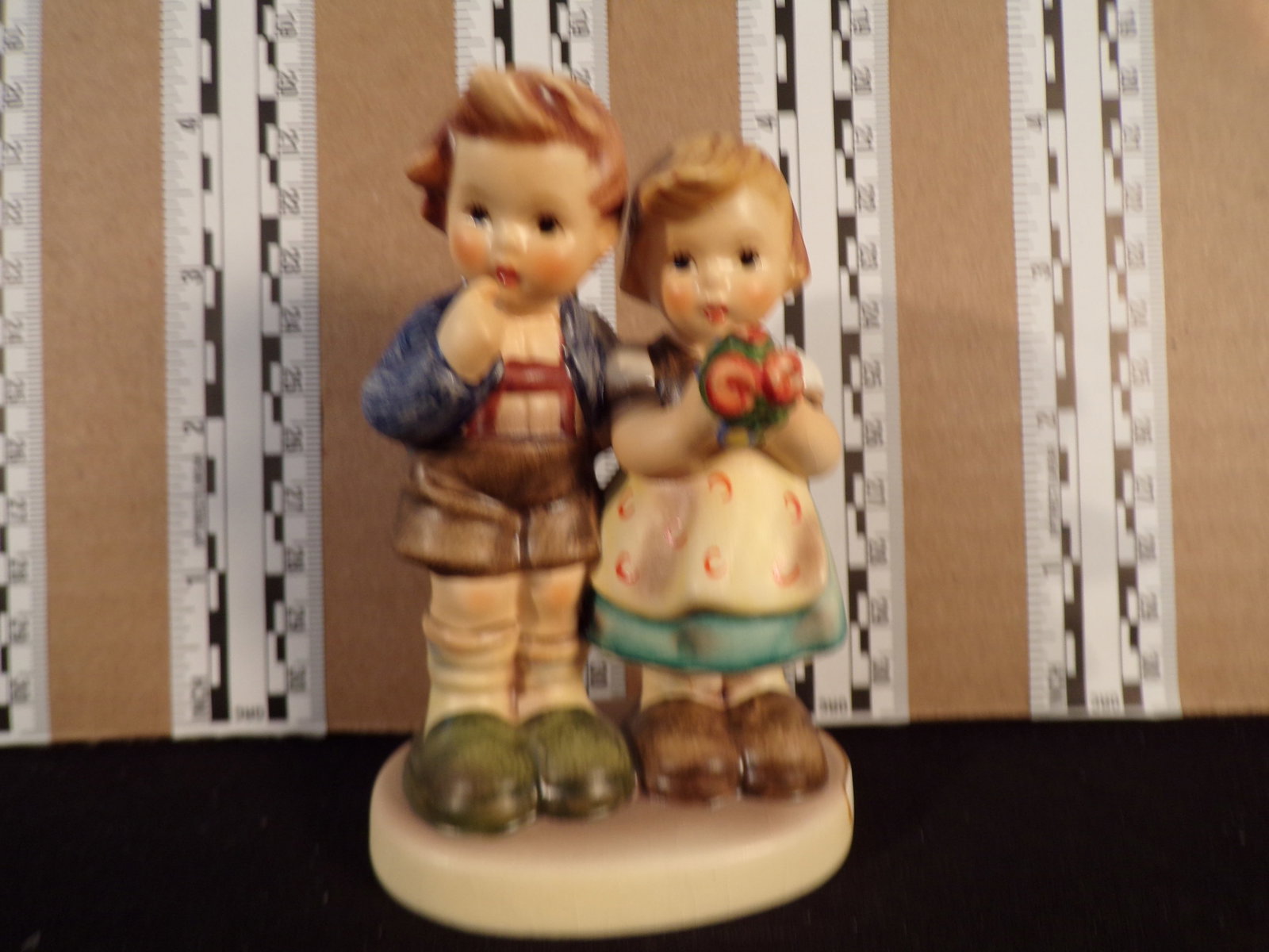 Hummel #220, Trademark # - 6, Figurine Name - We Congratulate: Up for auction is Hummel #220, Trademark # - 6, Figurine Name - We Congratulate, This hummel does not have a box and displays these special attributes: None. This Hummel is in excellent condition with