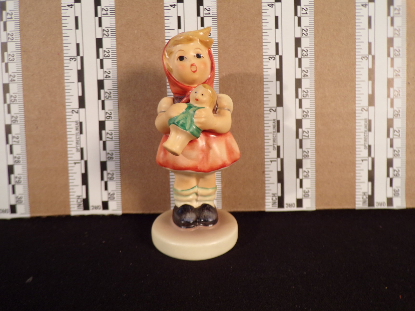 Hummel #239, Size Indicator # - 239/b Trademark # - 5, Figurine Name - Girl With Doll: Up for auction is Hummel #239, Size Indicator - 239/b, Trademark # - 5, Figurine Name - Girl With Doll, This hummel does not have a box and displays these special attributes: None. This Hummel is in e