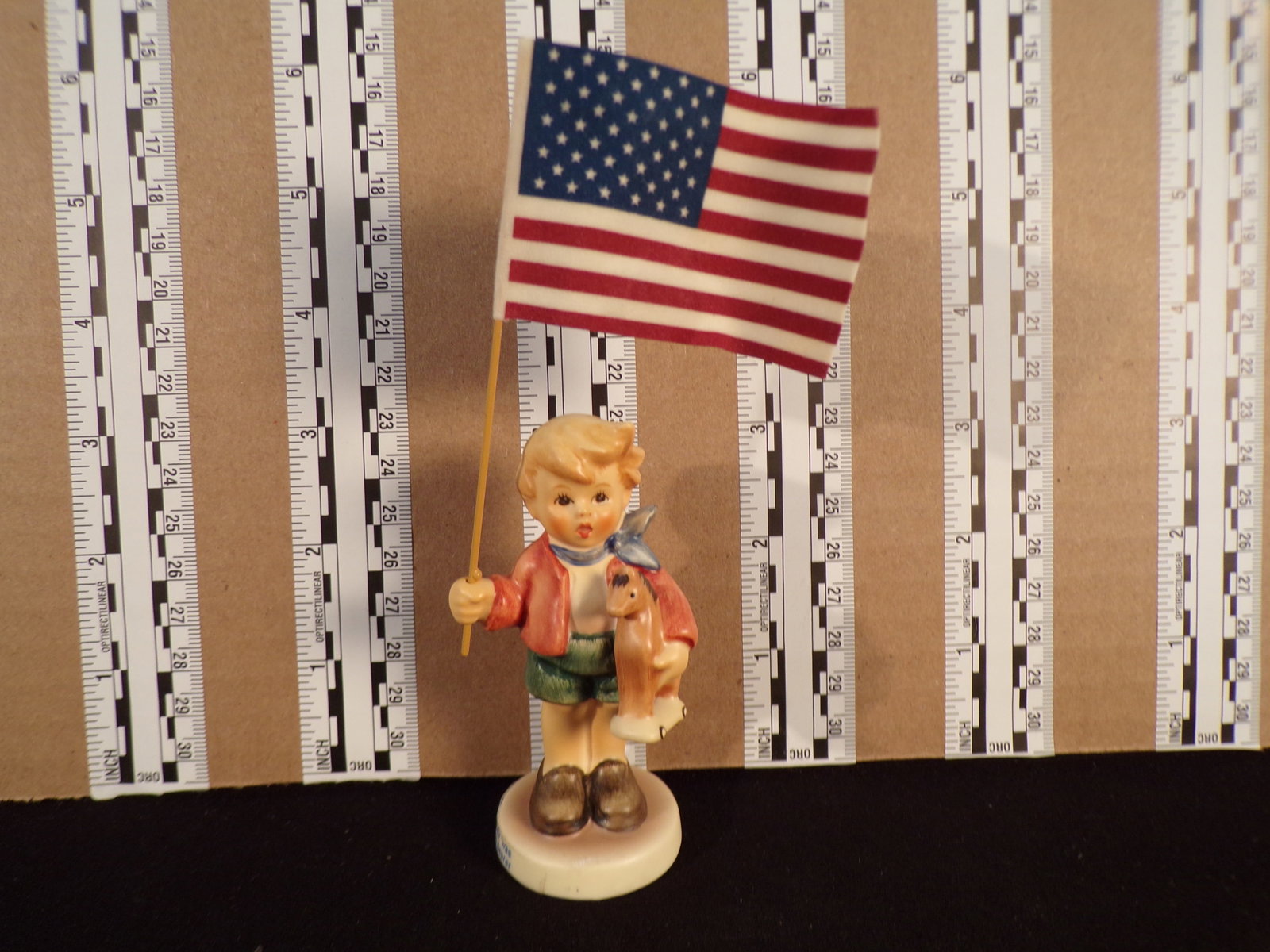Hummel #239, Size Indicator # - 239/e Trademark # - 8, Figurine Name - Little Flag Bearer: Up for auction is Hummel #239, Size Indicator - 239/e, Trademark # - 8, Figurine Name - Little Flag Bearer, This hummel does have a box and displays these special attributes: Missing. This Hummel is i