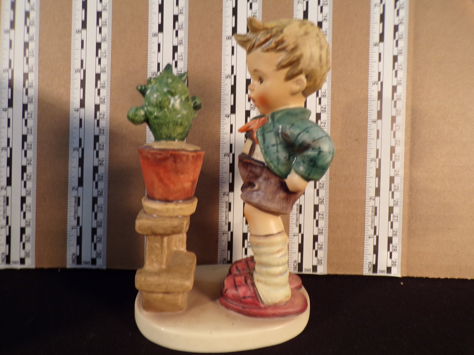 Hummel #314, Trademark # - 6, Figurine Name - Confidentially: Up for auction is Hummel #314, Trademark # - 6, Figurine Name - Confidentially, This hummel does not have a box and displays these special attributes: None. This Hummel is in excellent condition with 