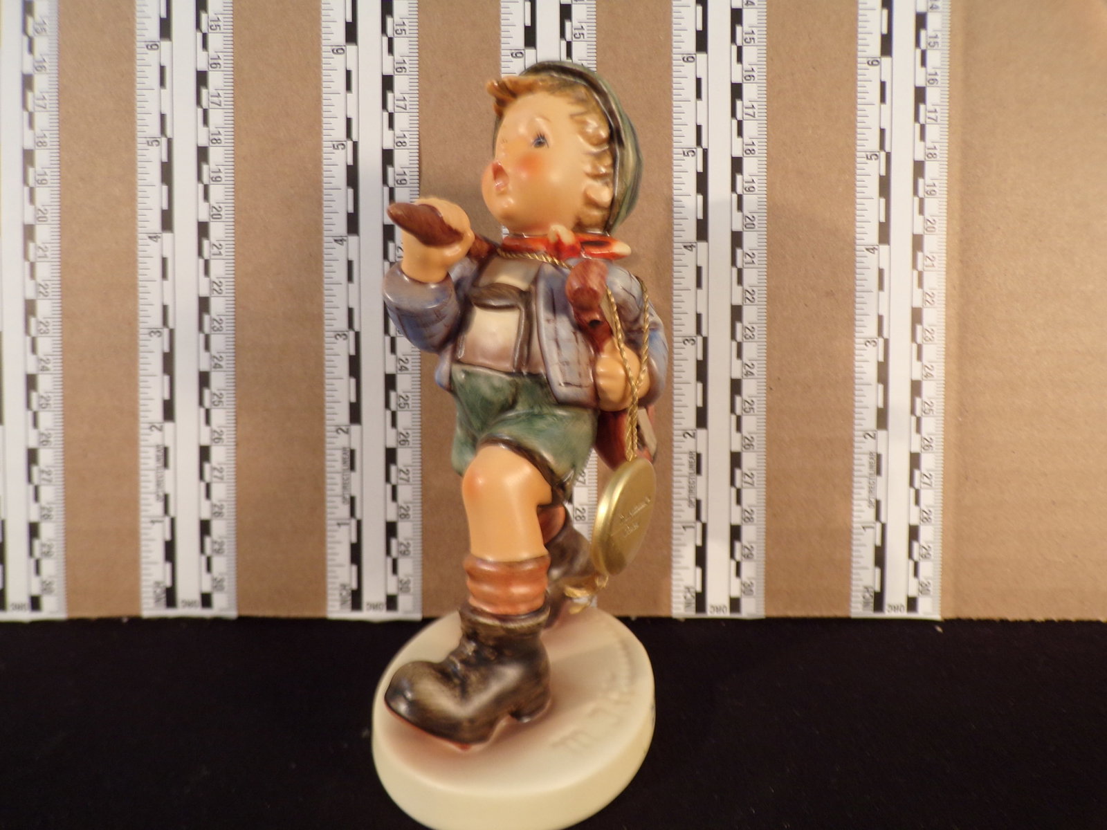 Hummel #327, Trademark # - 7, Figurine Name - The Run-A-Way: Up for auction is Hummel #327, Trademark # - 7, Figurine Name - The Run-A-Way, This hummel does have a box and displays these special attributes: None. This Hummel is in excellent condition with no ch