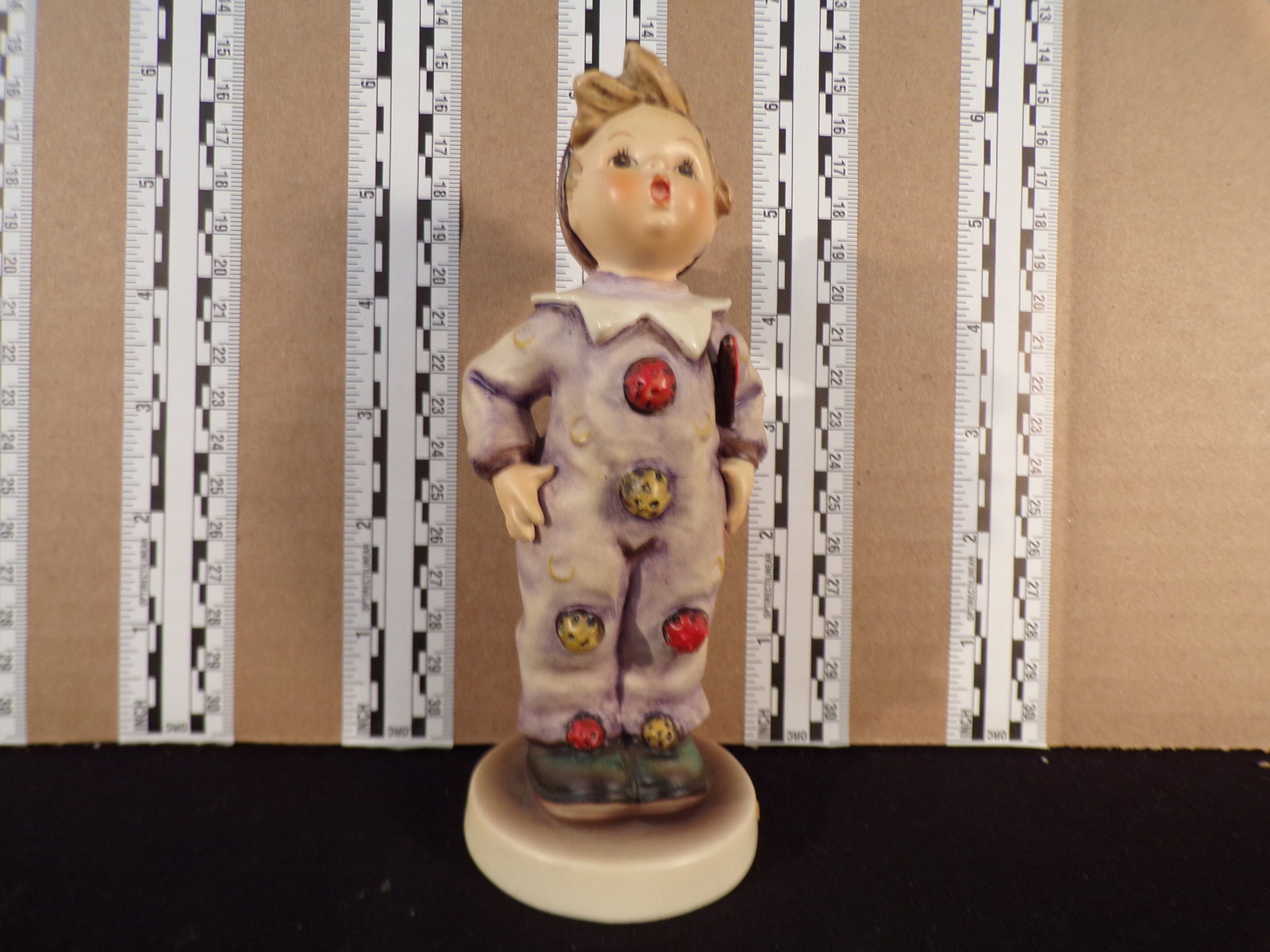 Hummel #328, Trademark # - 4, Figurine Name - Carnival: Up for auction is Hummel #328, Trademark # - 4, Figurine Name - Carnival, This hummel does not have a box and displays these special attributes: None. This Hummel is in excellent condition with no chi