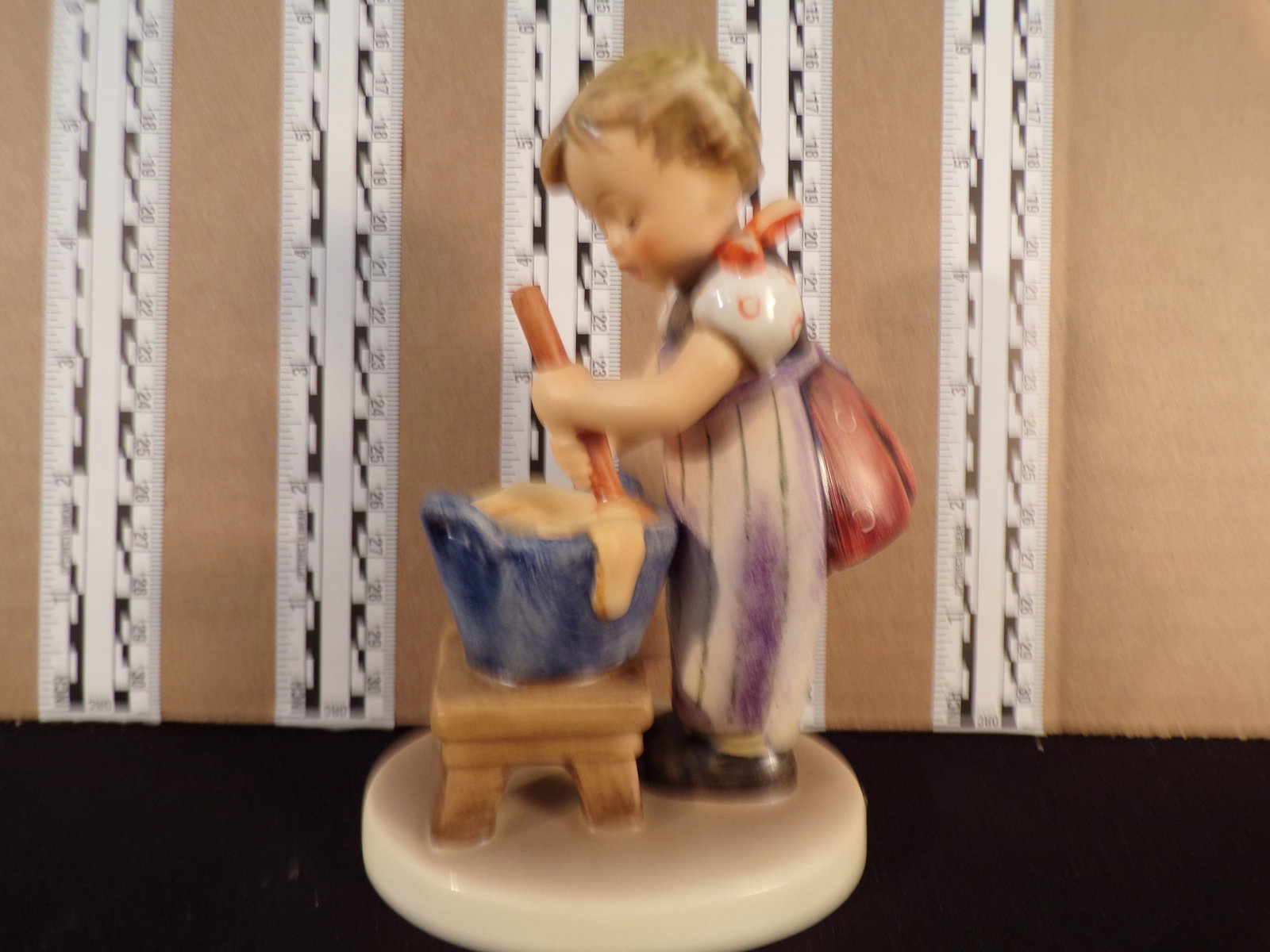 Hummel #330, Trademark # - 6, Figurine Name - Baking Day: Up for auction is Hummel #330, Trademark # - 6, Figurine Name - Baking Day, This hummel does have a box and displays these special attributes: None. This Hummel is in excellent condition with no chips