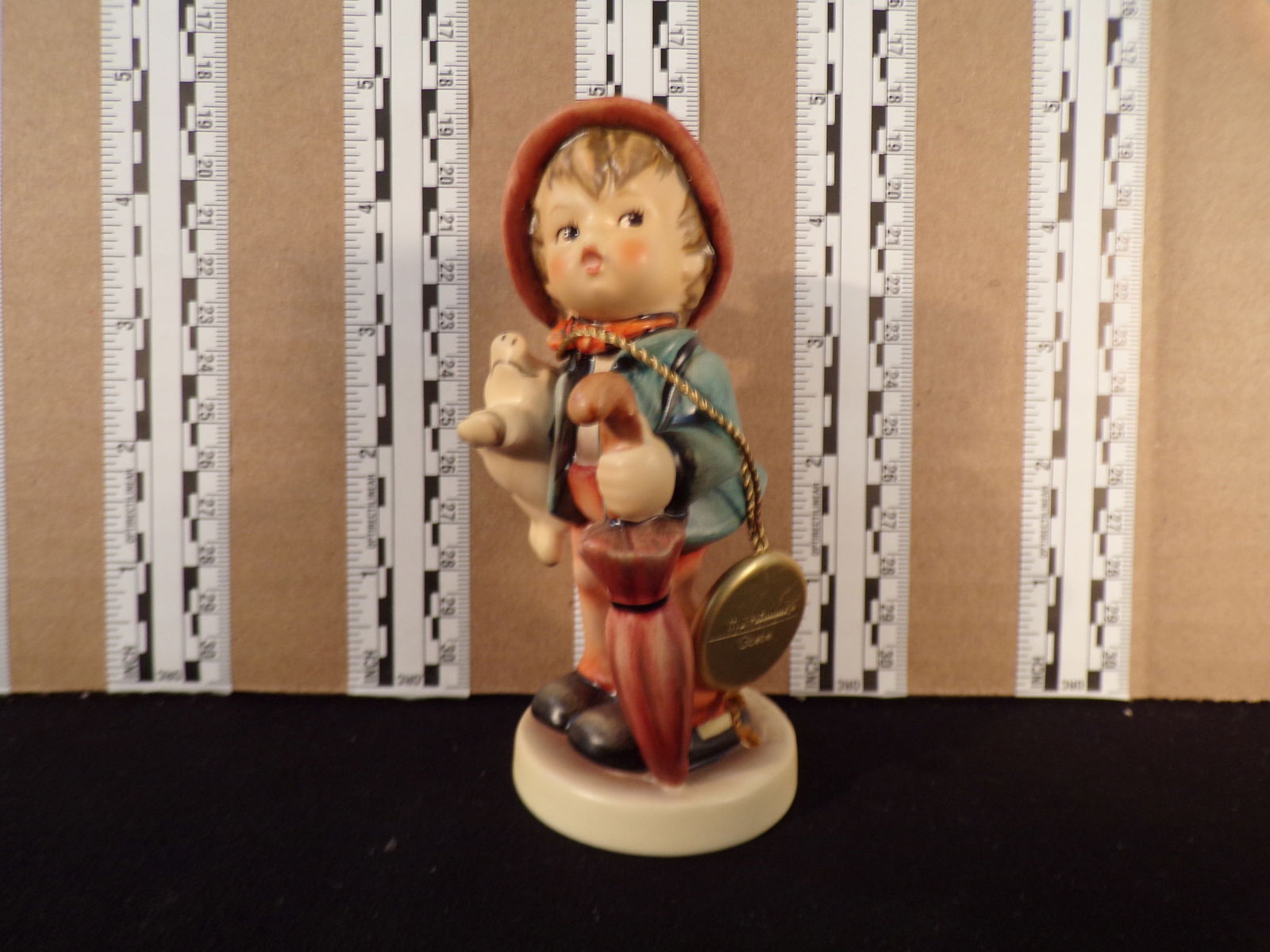 Hummel #335,  Size Indicator # - 335/0 Trademark # - 7, Figurine Name - Lucky Boy (1 of 3)