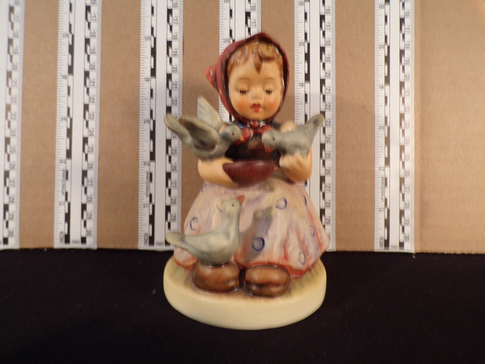 Hummel #337, Trademark # - 5, Figurine Name - Cinderella: Up for auction is Hummel #337, Trademark # - 5, Figurine Name - Cinderella, This hummel does not have a box and displays these special attributes: None. This Hummel is in excellent condition with no c